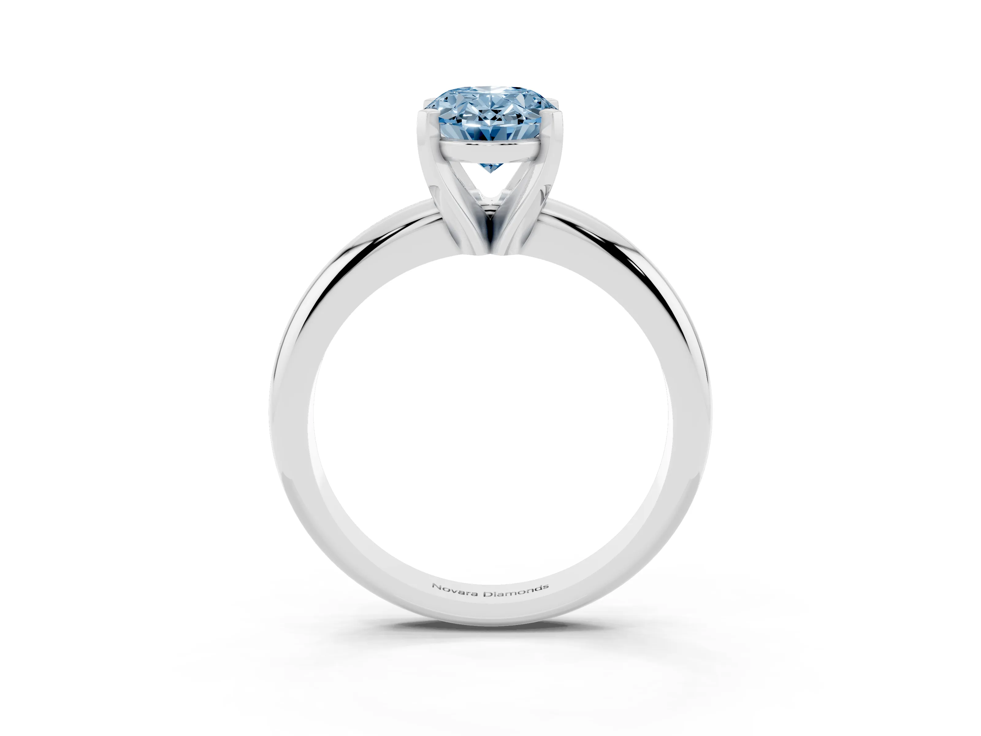 Fancy Blue Oval Cut Diamond Solitaire Engagement Ring Set in White gold with Round Band and Prong Setting