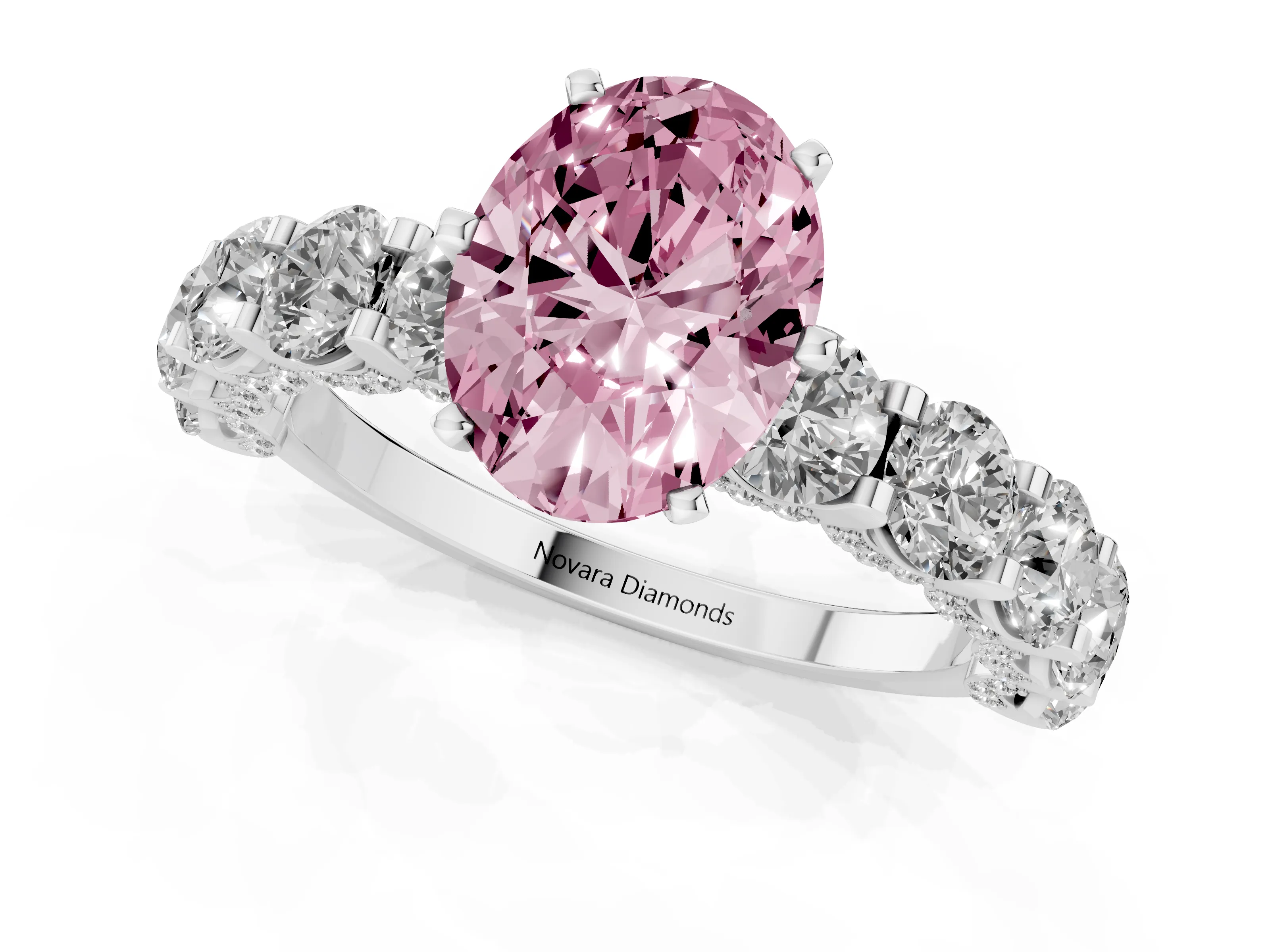 Fancy Pink Oval Cut Diamond Side Stone Ring Set in Platinum with Alternating Round and Oval Side Stones