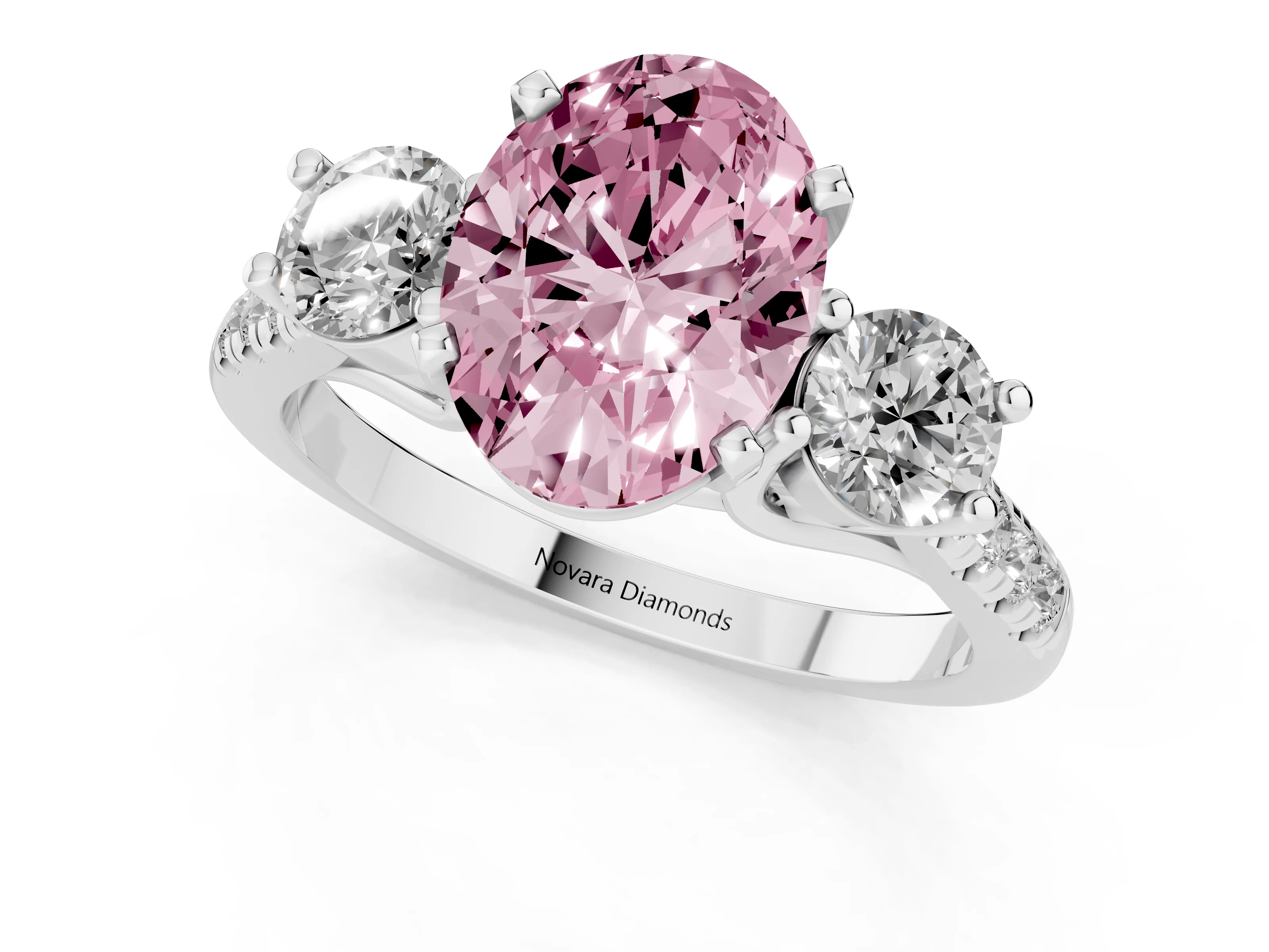 Fancy Pink Three-Stone Oval Cut Diamond Pavé Band Ring Set in White gold with Prong-Set Trio