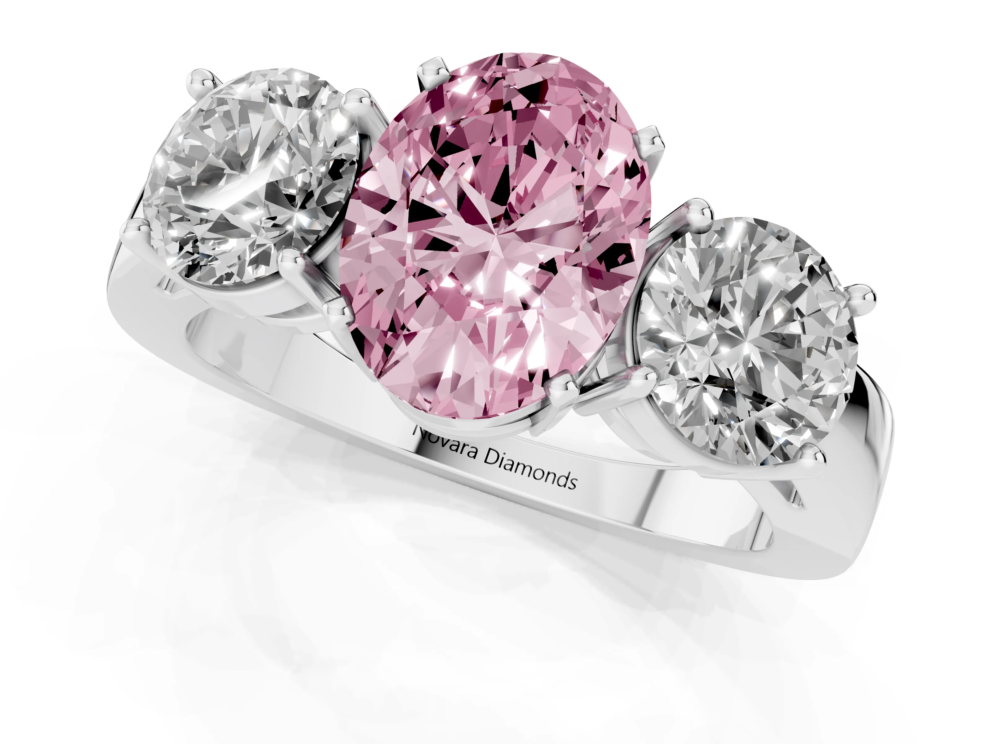 Fancy Pink Oval Cut Diamond Three-Stone Ring Set in White gold with Round Side Stones and Classic Band