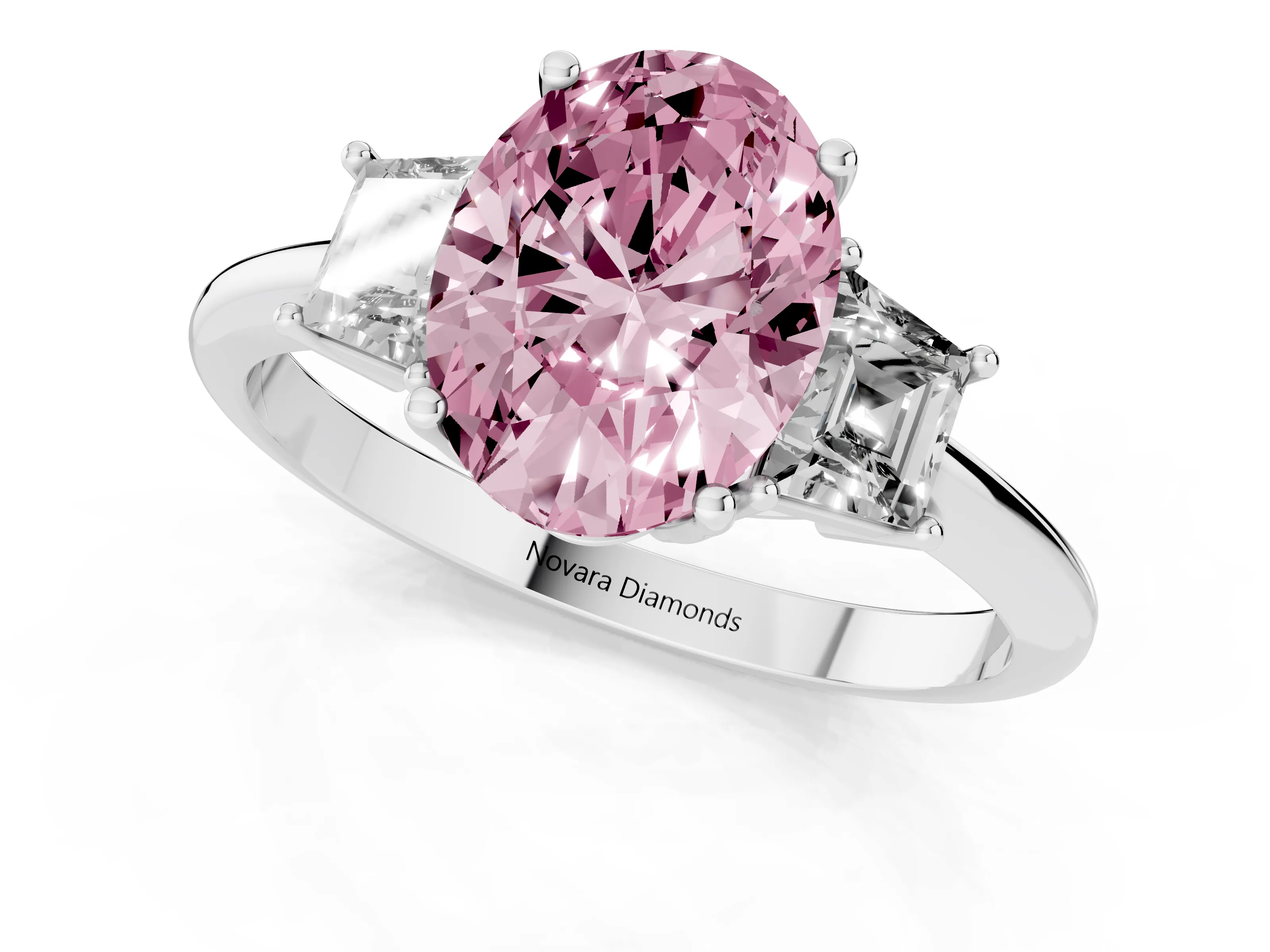 Fancy Pink Oval Cut Diamond Three-Stone Ring Set in White gold with Trapezoid Side Stones and Prong Setting