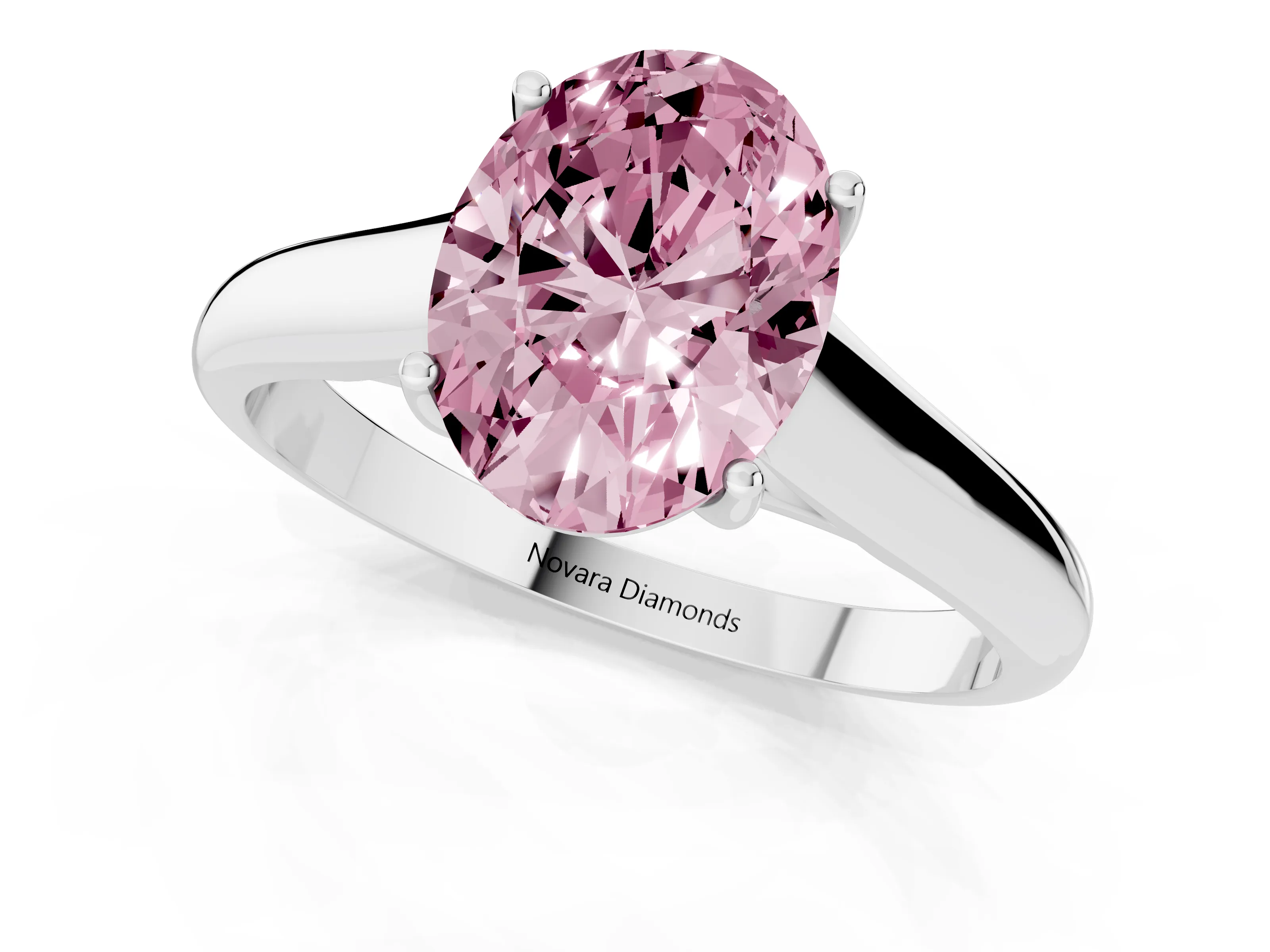 Fancy Pink Oval Cut Diamond Solitaire Engagement Ring Set in White gold with Subtly Tapered Band and Prong Setting