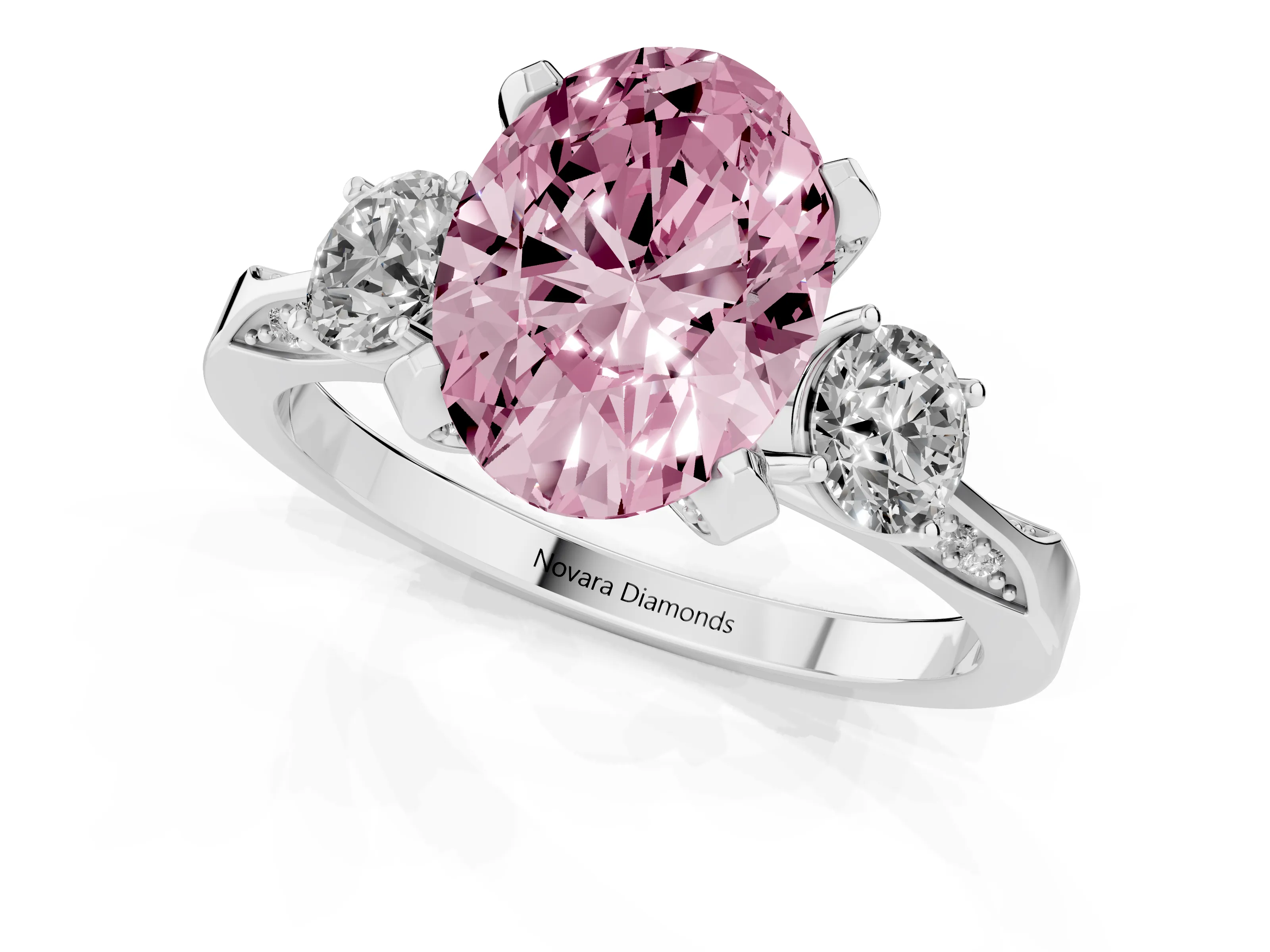 Fancy Pink Oval Cut Diamond Three-Stone Ring Set in Silver with Pavé Band and Smaller Side Stones
