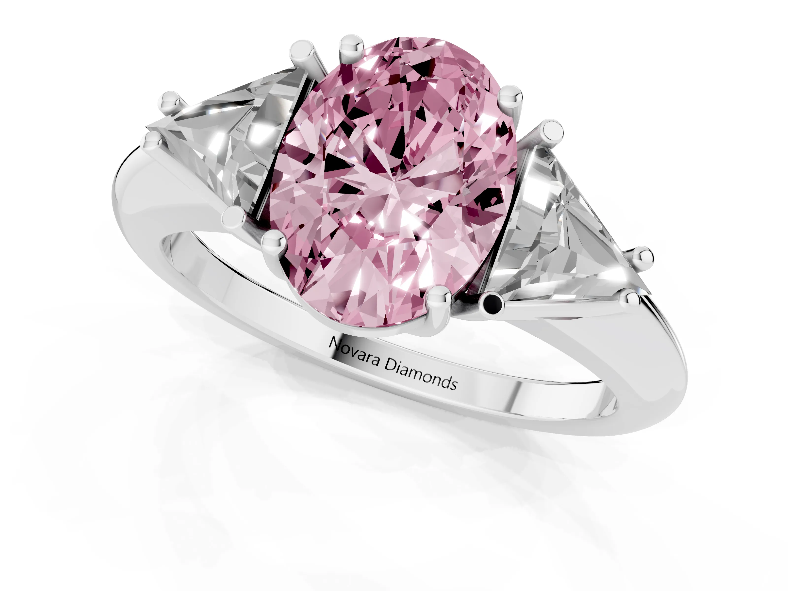 Fancy Pink Oval Cut Diamond Three-Stone Engagement Ring Set in Platinum with Trillion Side Stones