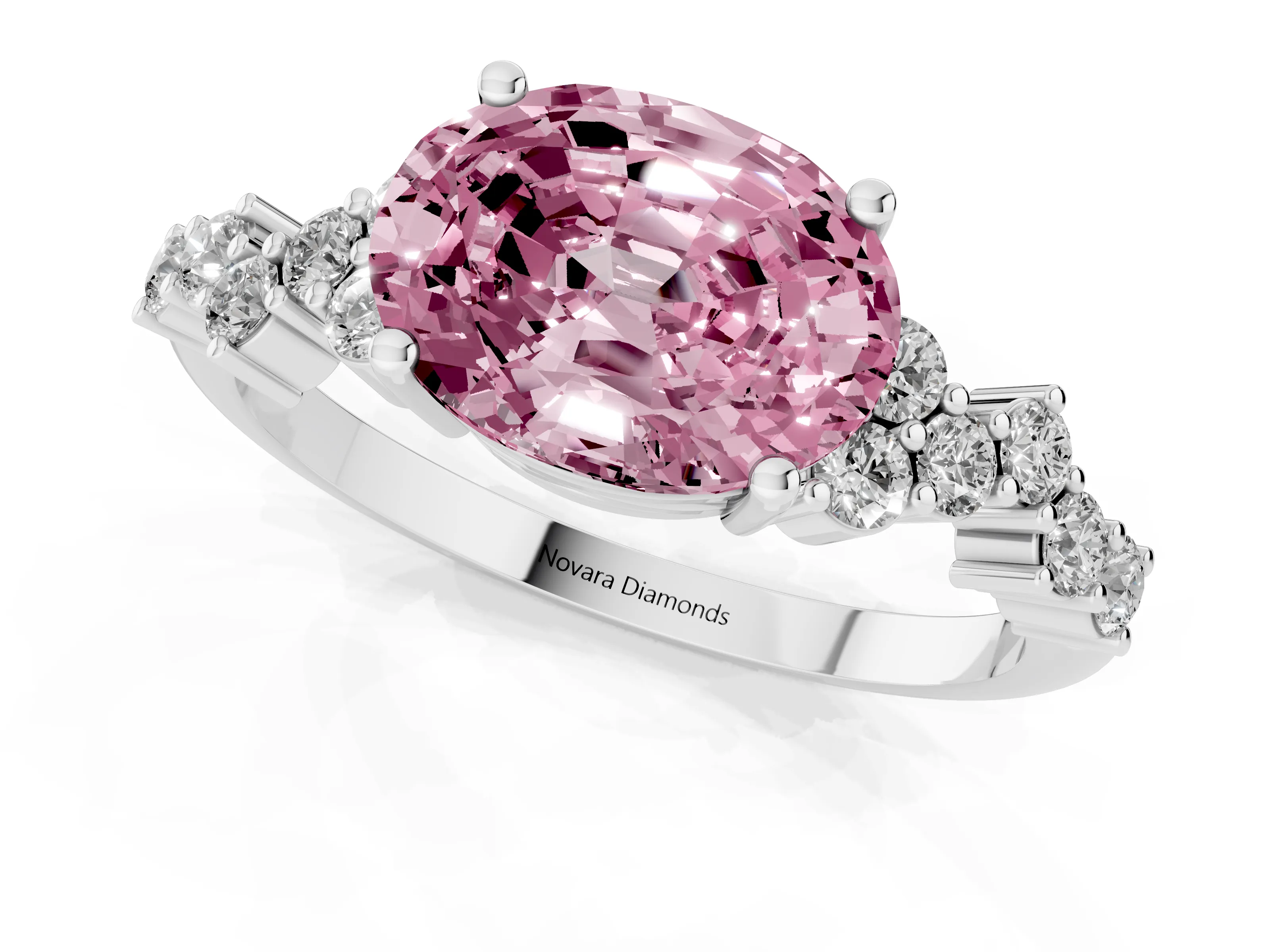 Fancy Pink Oval Cut Diamond Ring Set in Platinum with Scattered Round Accents