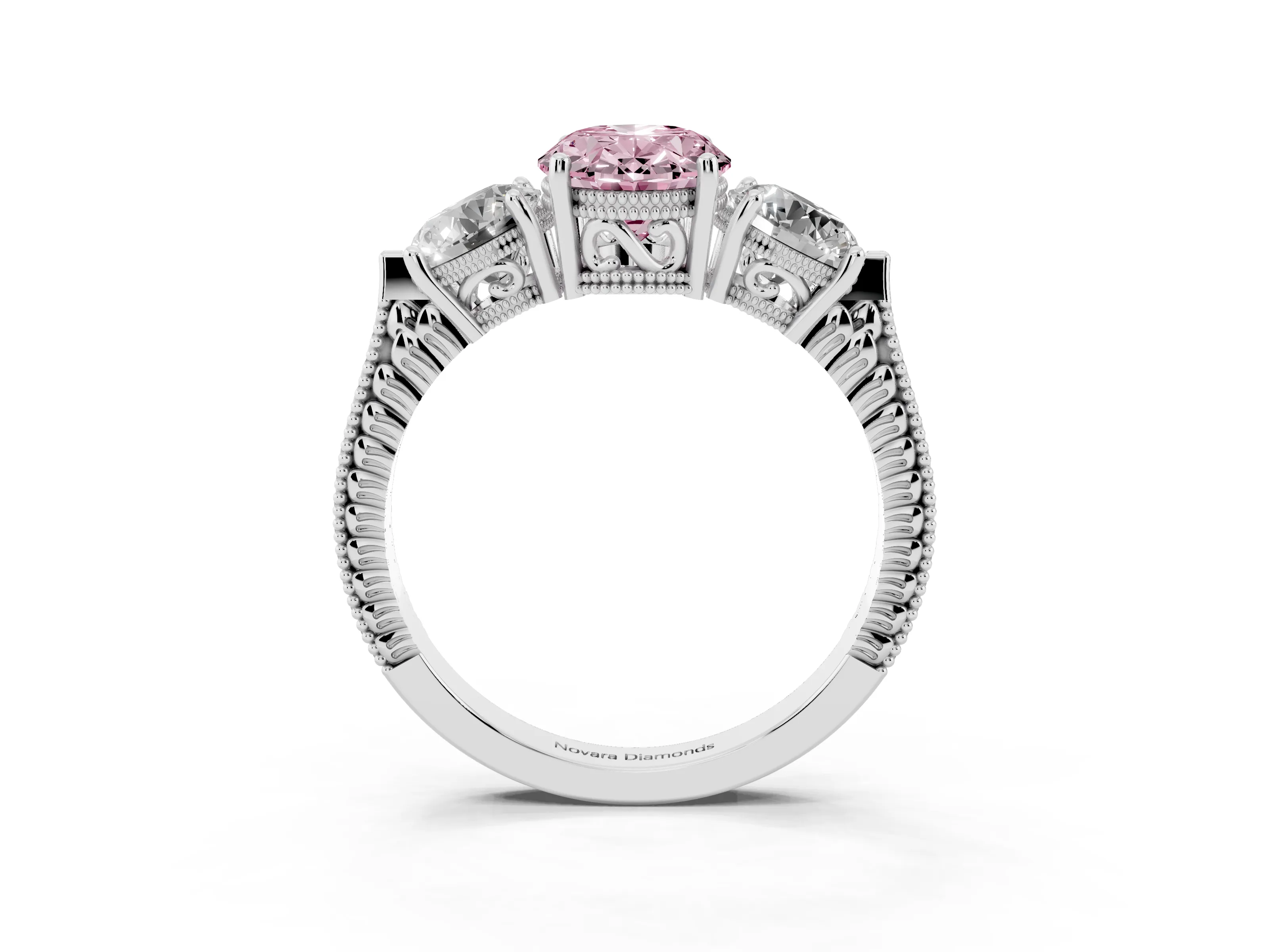 Fancy Pink Oval Cut Diamond Three-Stone Ring Set in Platinum with Milgrain Band
