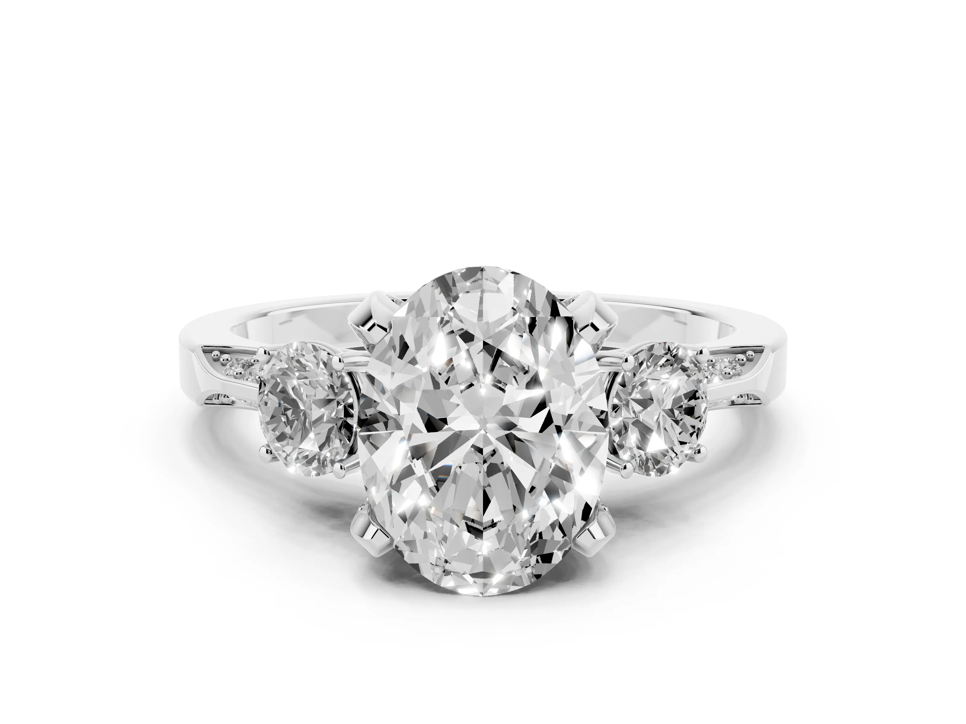 Oval Cut Diamond Three-Stone Ring Set in White gold with Pavé Band and Smaller Side Stones