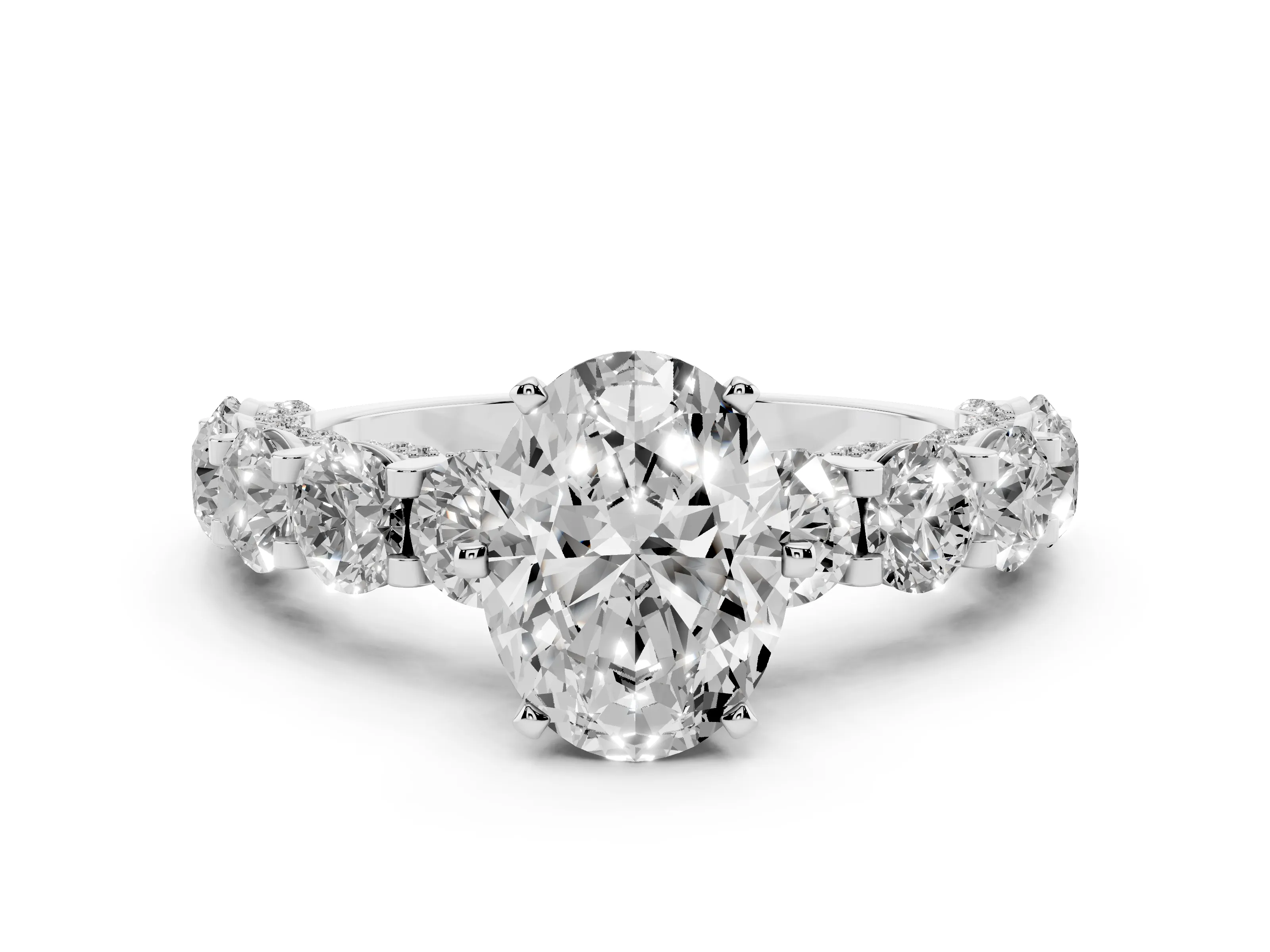 Oval Cut Diamond Side Stone Ring Set in White gold with Alternating Round and Oval Side Stones