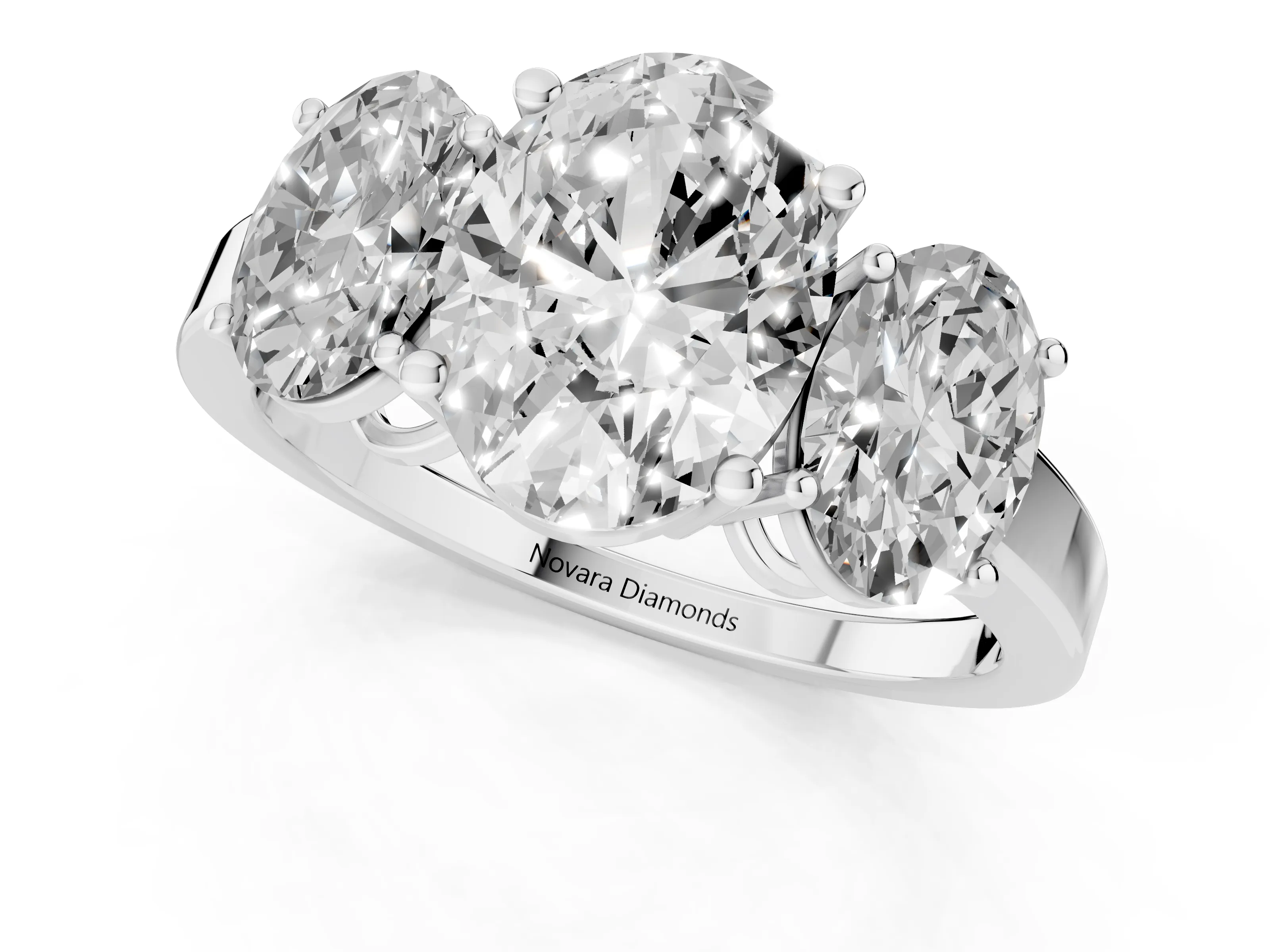 Oval Cut Diamond Three-Stone Engagement Ring Set in Silver with Flat Band