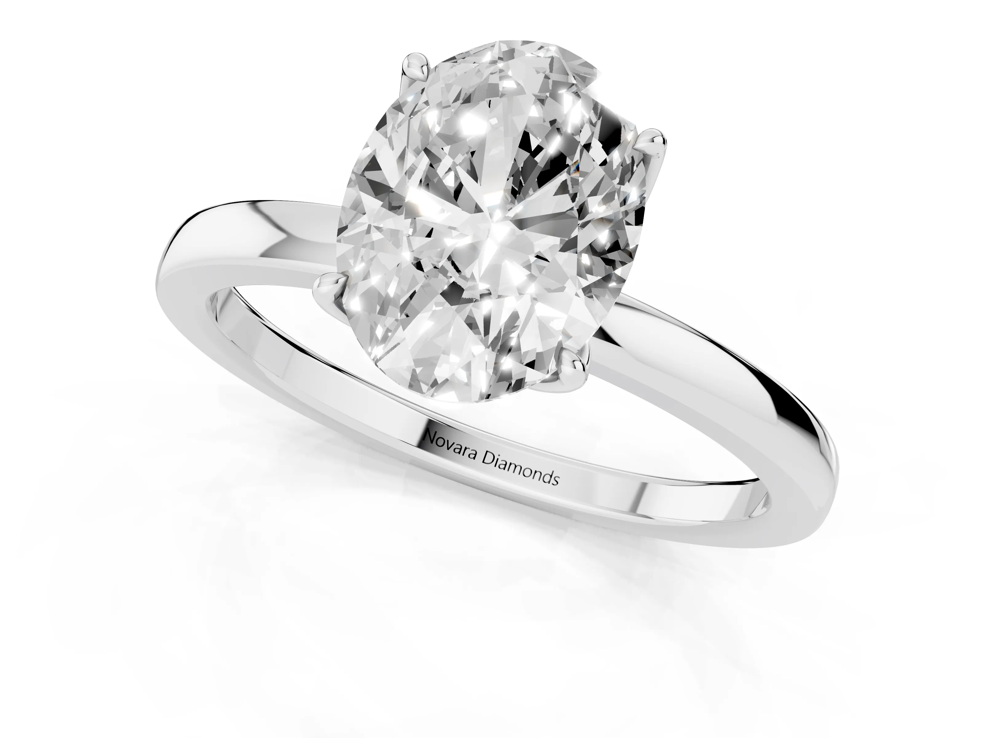 Oval Cut Diamond Solitaire Ring Set in Silver with Prong Setting and Thin Polished Band