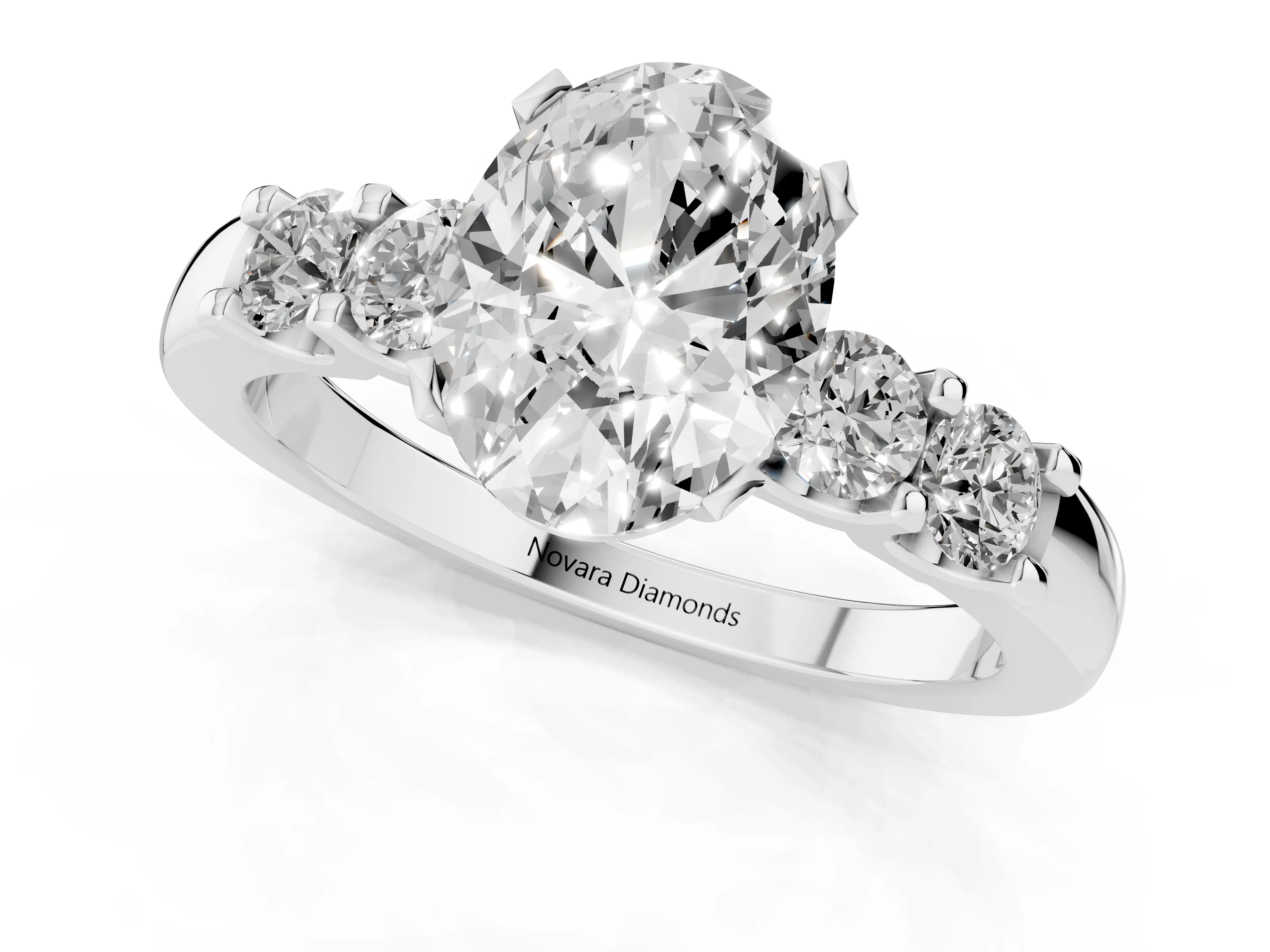 Oval Cut Diamond Five-Stone Prong Set Engagement Ring Set in Platinum with Channel Band