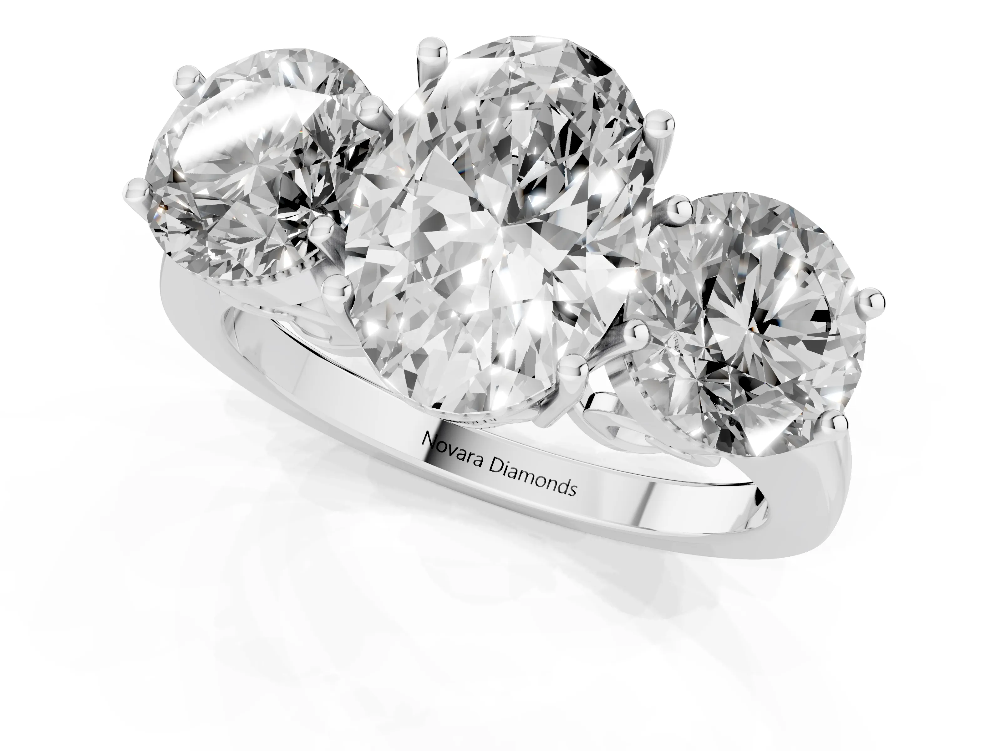 Oval Cut Diamond Three-Stone Engagement Ring Set in White gold with Polished Band