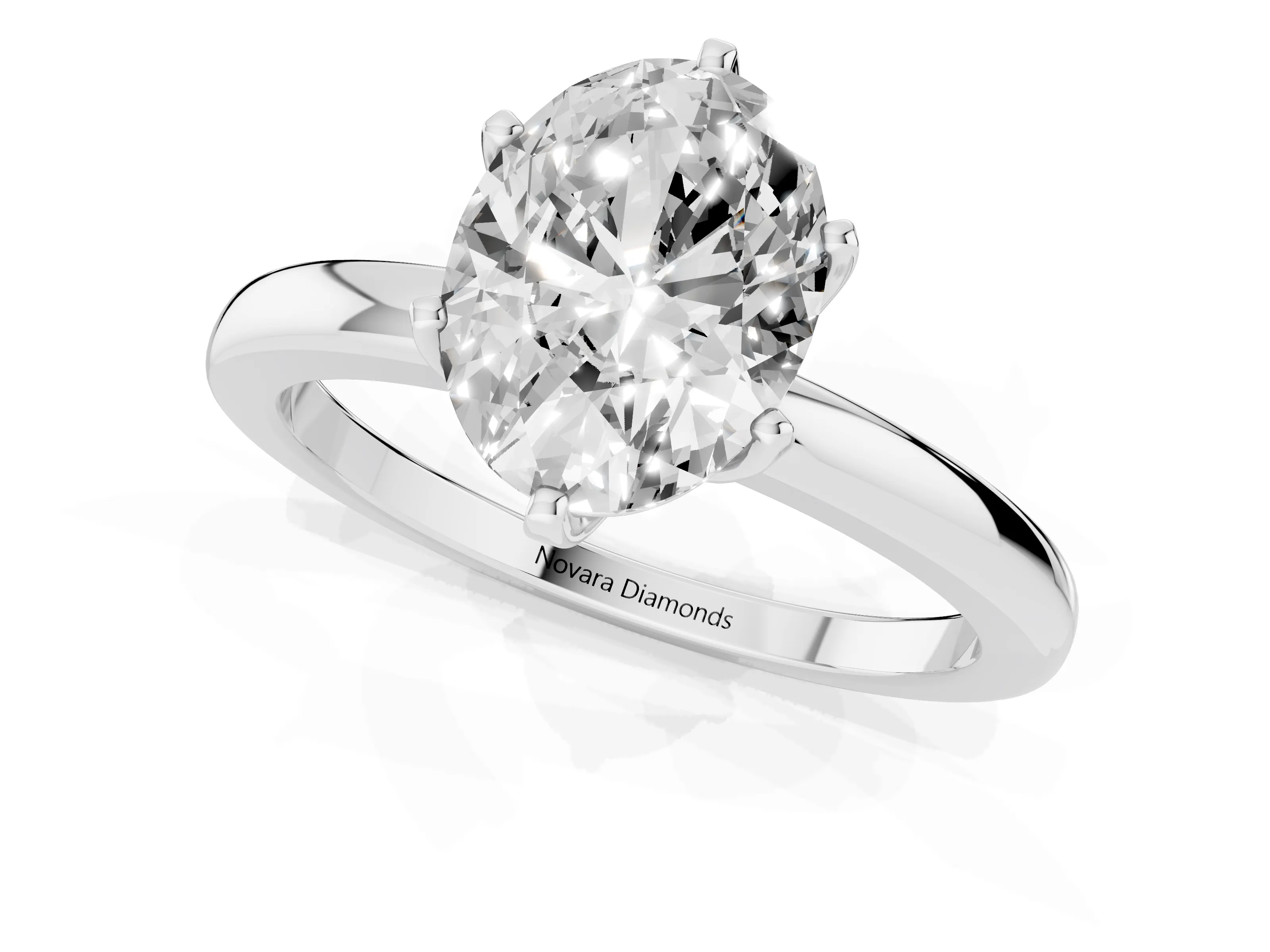Oval Cut Diamond Solitaire Ring Set in White gold with Raised Prong Setting on a Classic Band