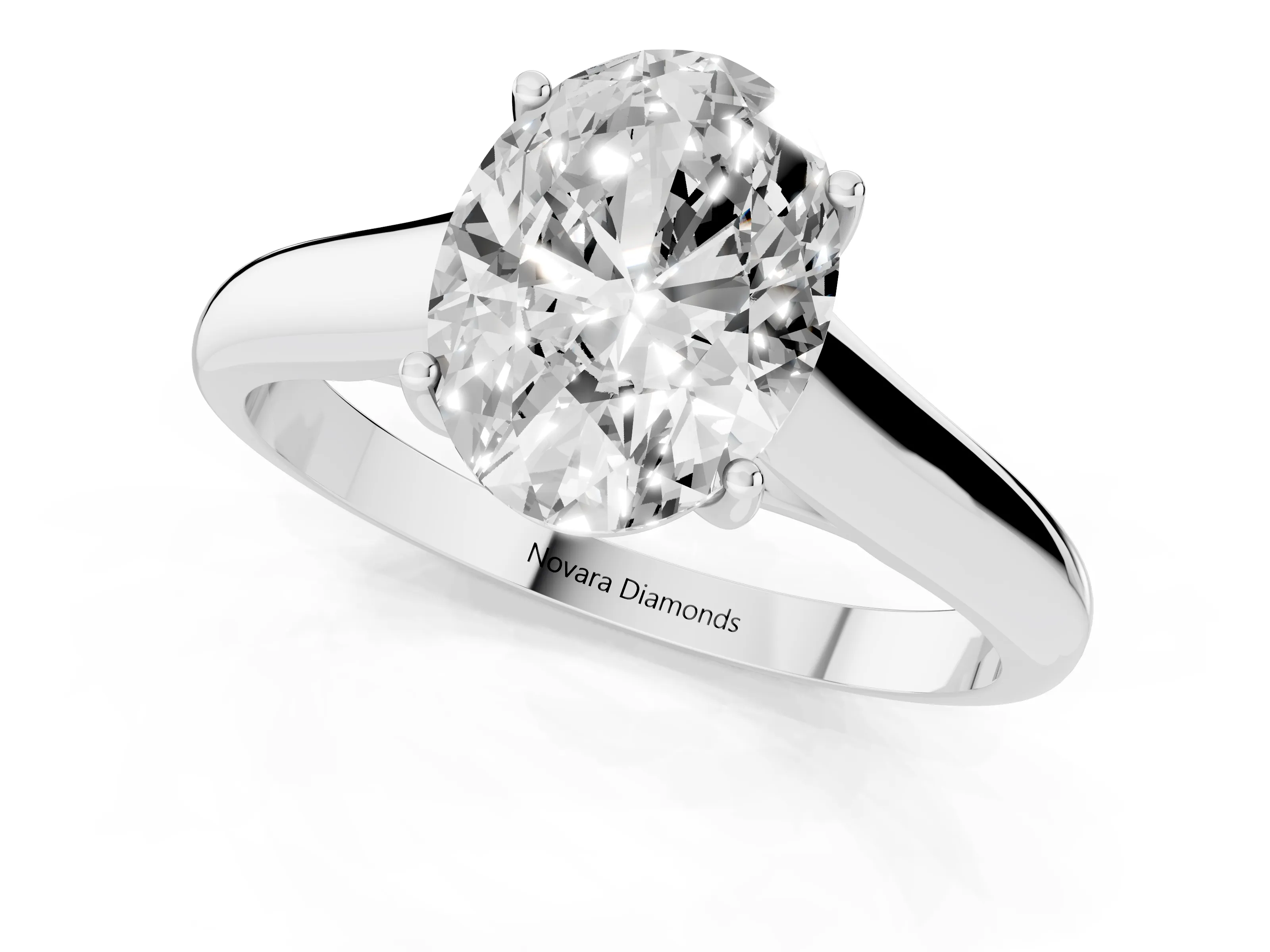 Oval Cut Diamond Solitaire Engagement Ring Set in White gold with Subtly Tapered Band and Prong Setting