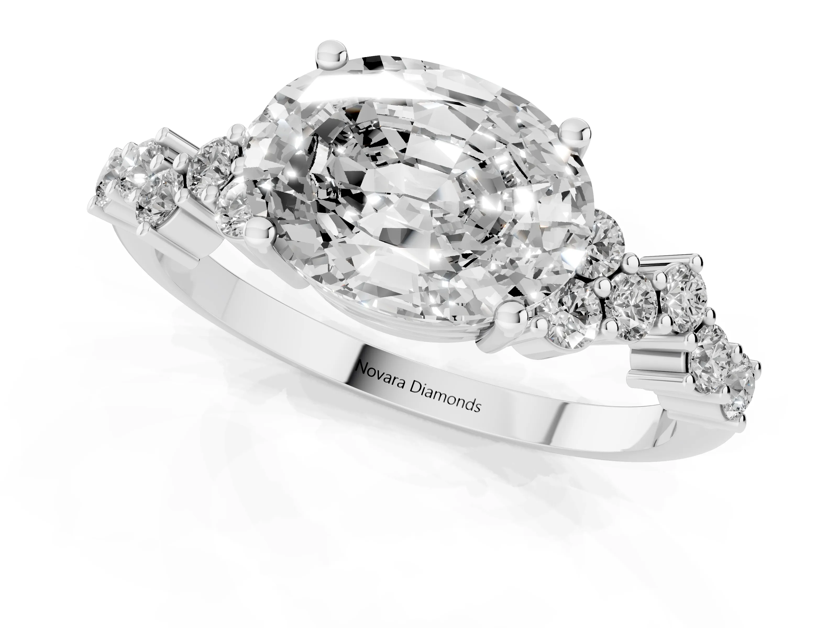 Oval Cut Diamond Ring Set in White gold with Scattered Round Accents