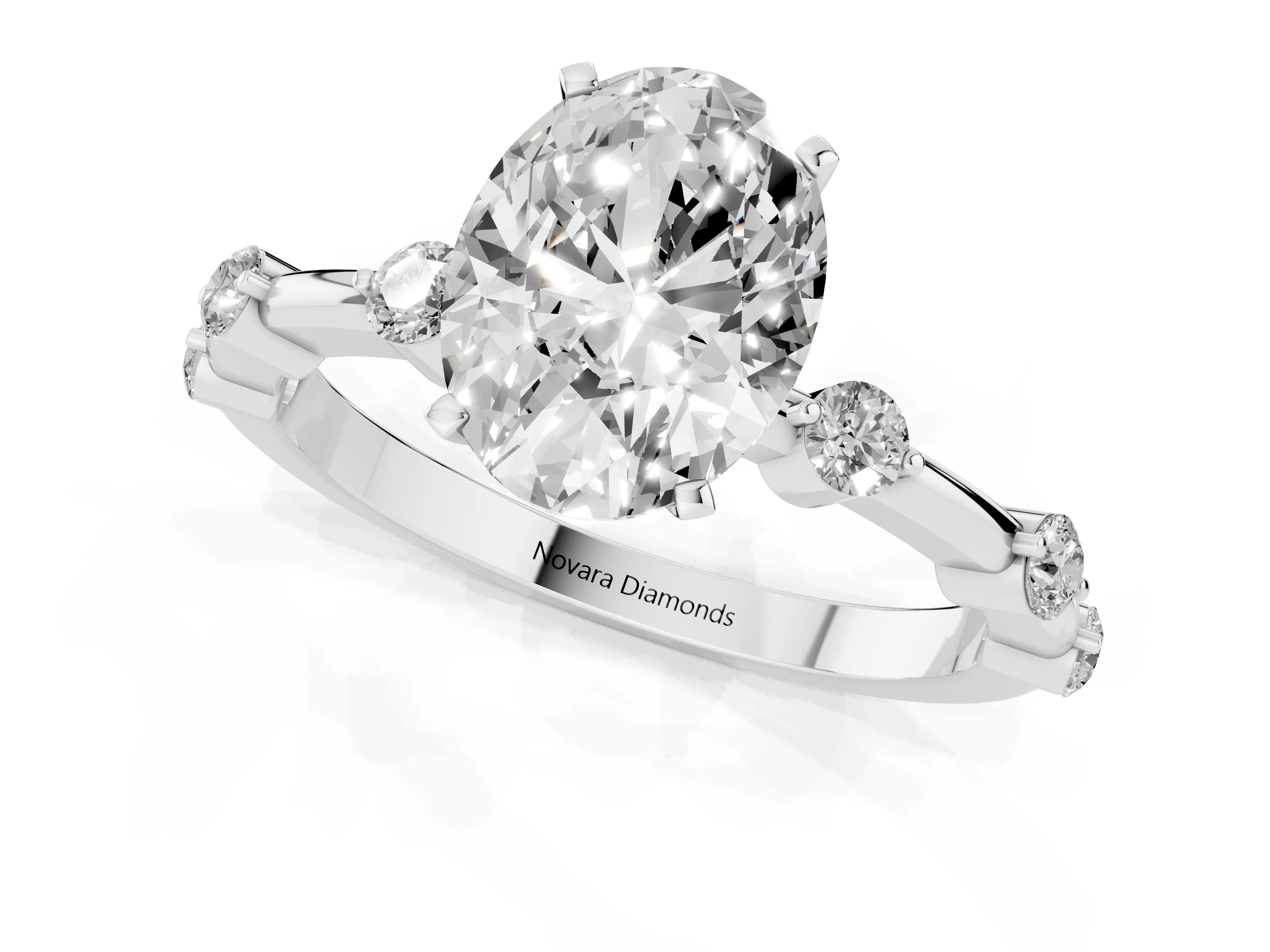 Oval Cut Diamond Solitaire Ring Set in Platinum with Bezel Set Side Stones and Prong Setting
