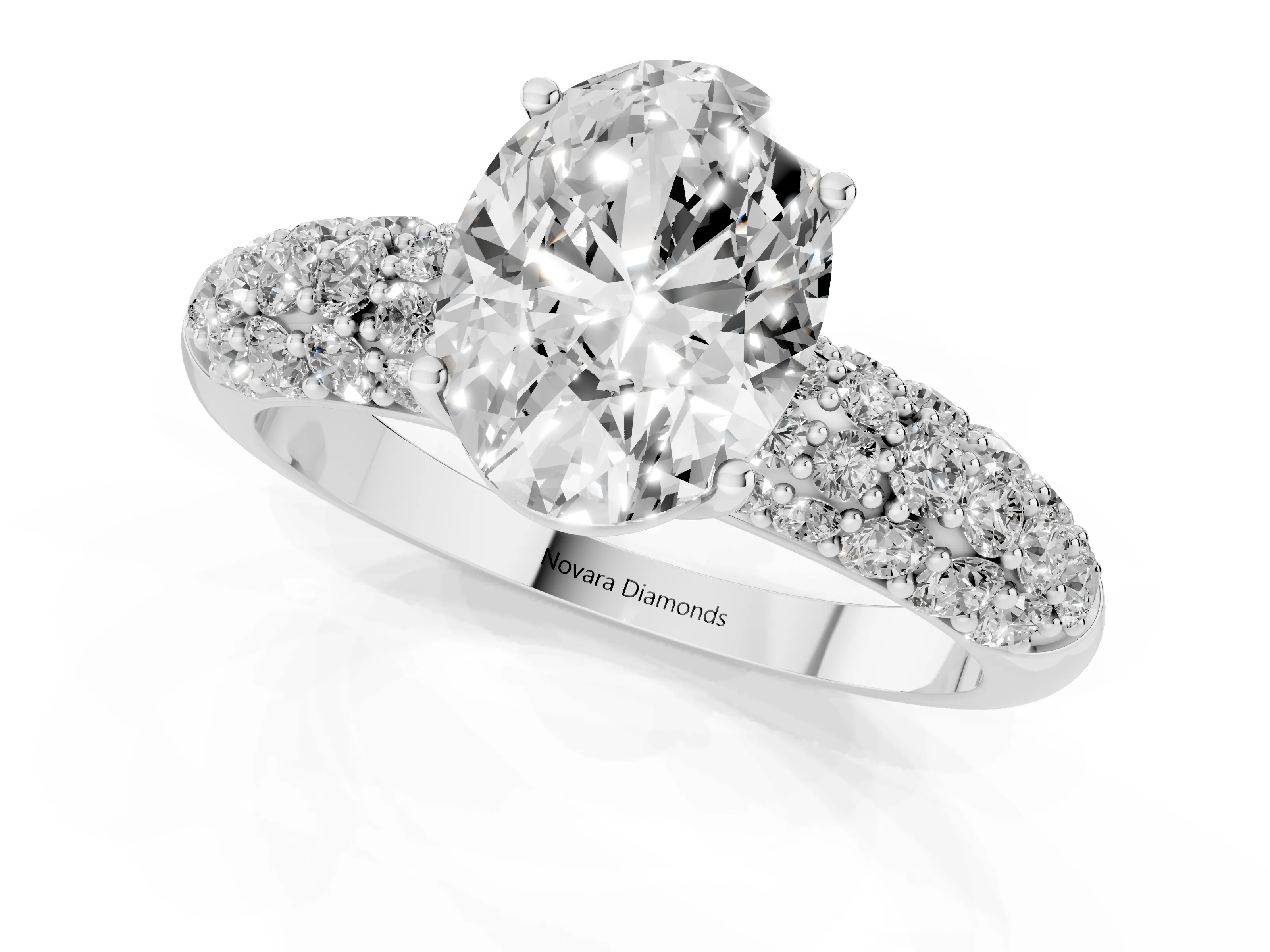 Oval Cut Diamond Pavé Band Solitaire Ring Set in White gold with Close-Set Accent Stones and Prong Setting