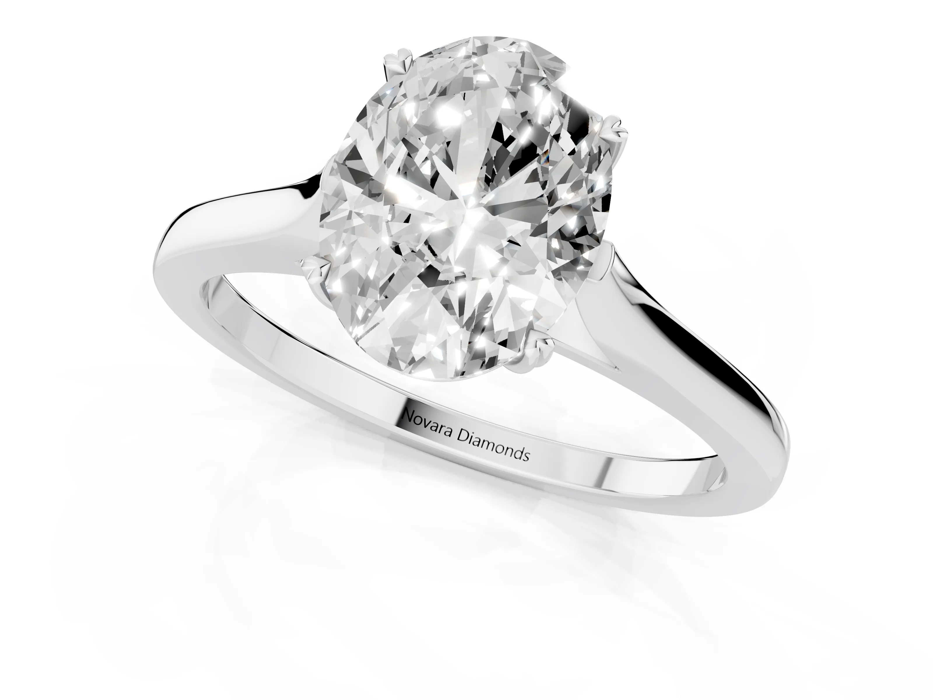 Oval Cut Diamond Solitaire Heart Prong Engagement Ring Set in Platinum with Tapered Band