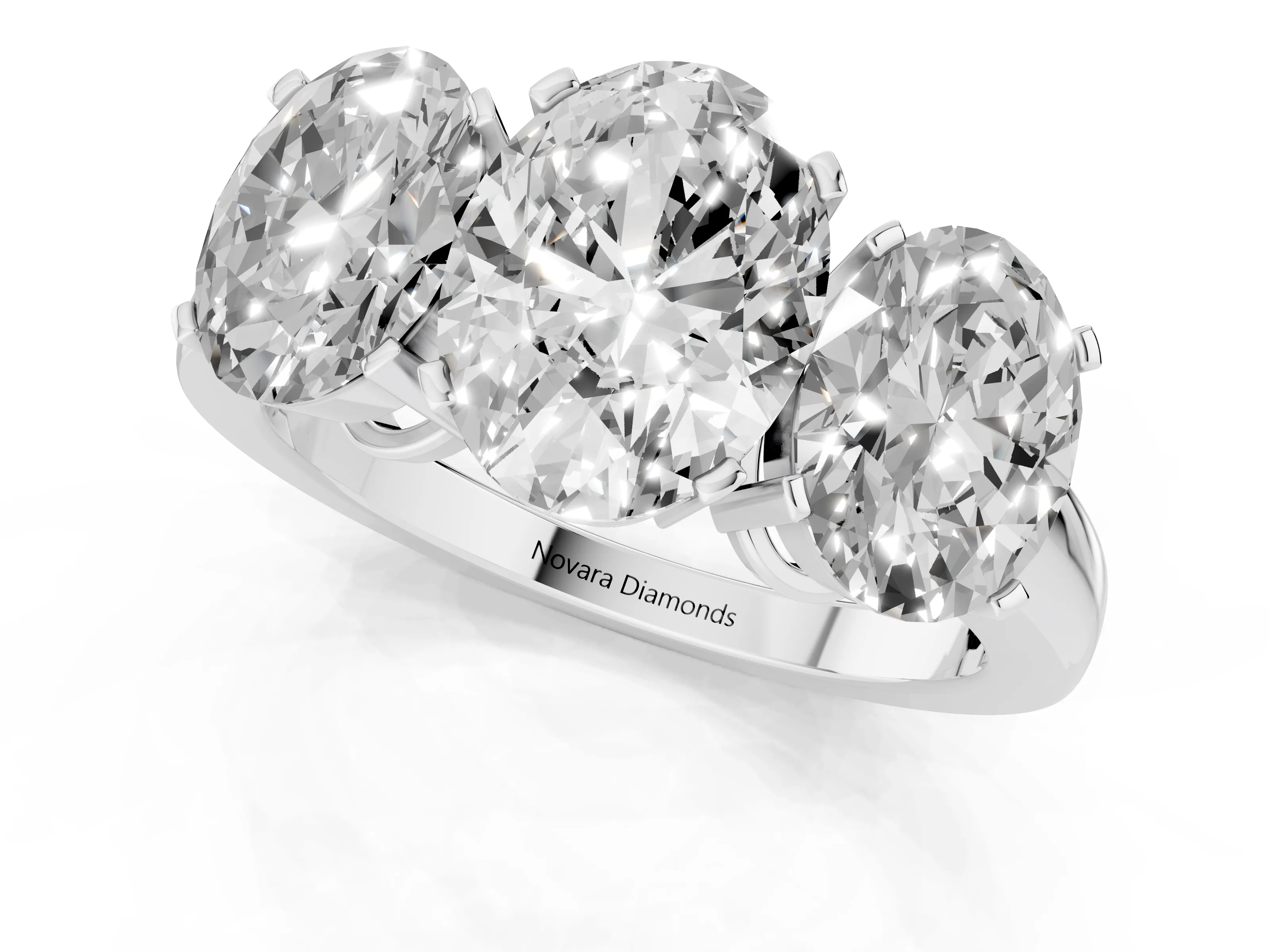 Oval Cut Diamond Three-Stone Ring Set in Silver with Channel-Set Band and Prong Settings