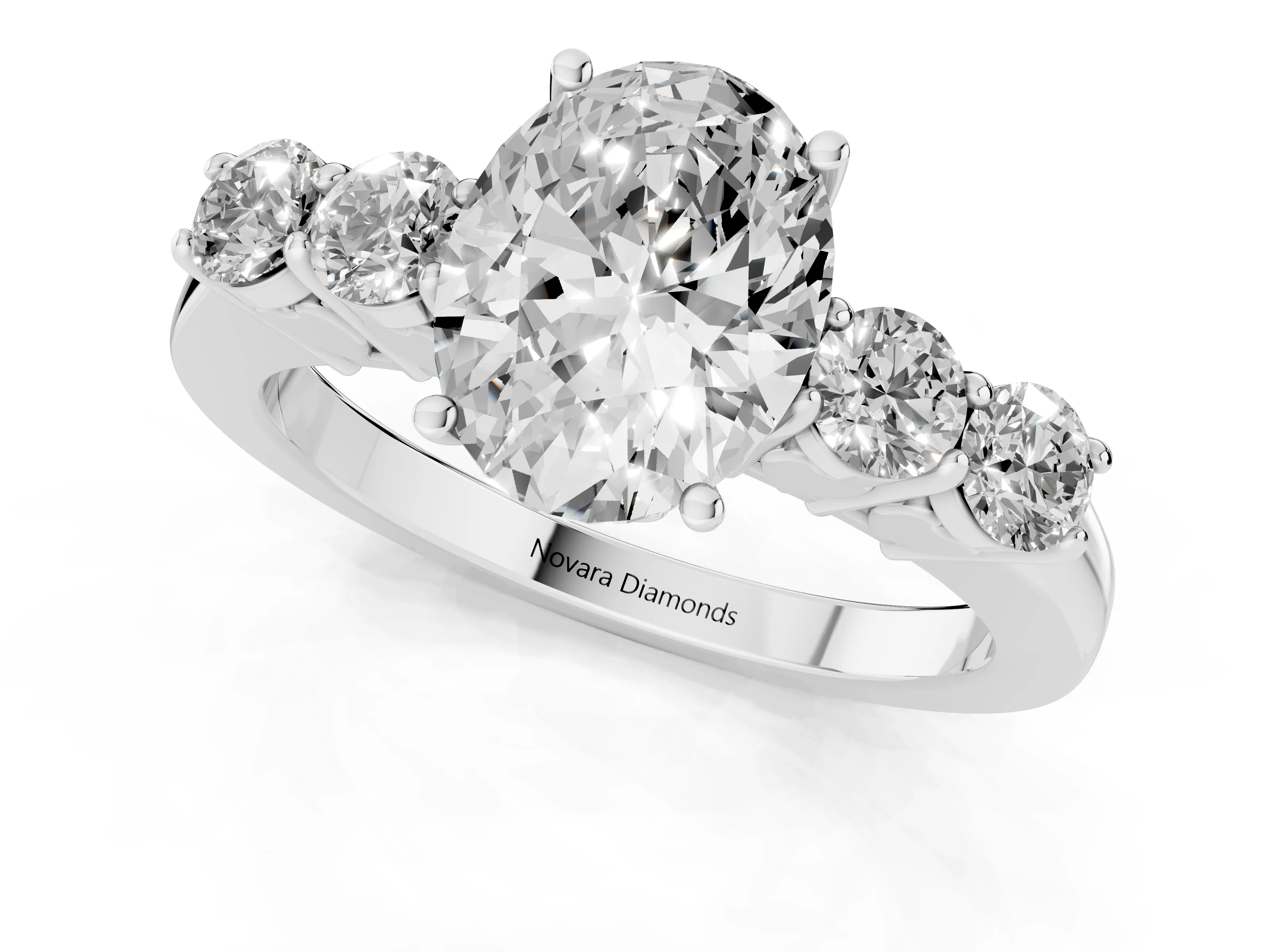 Oval Cut Diamond Five-Stone Prong Set Band Ring Set in Platinum with Polished Band