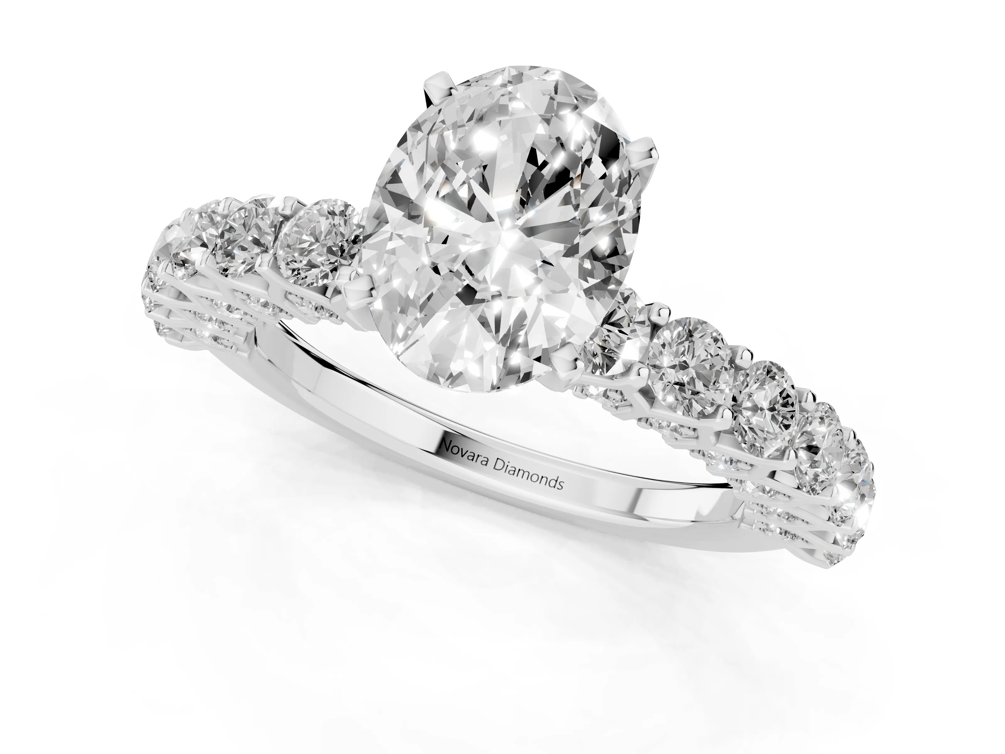 Oval Cut Diamond Solitaire Ring Set in Platinum with Shared Prong Pavé Band