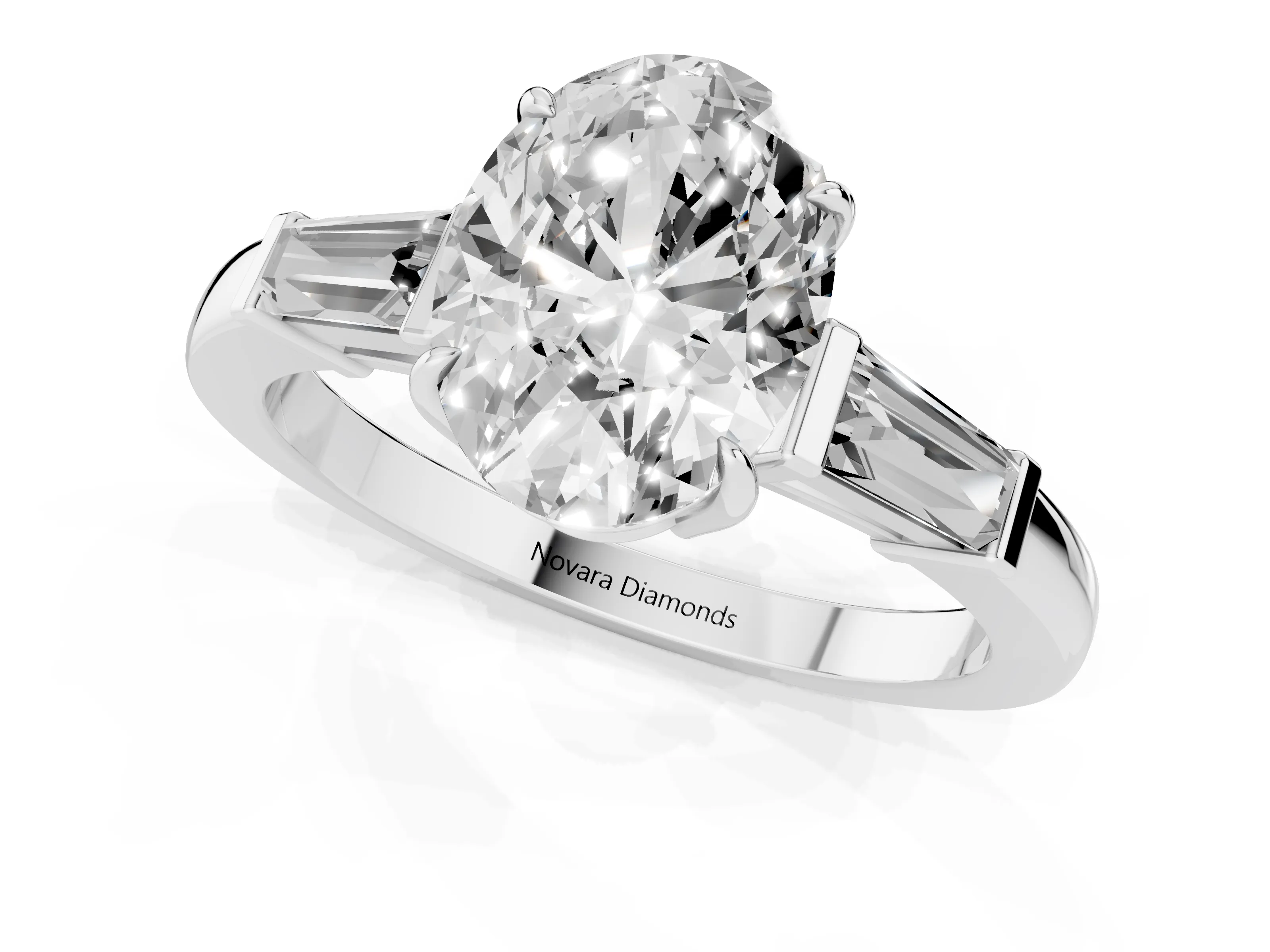 Oval Cut Diamond Three-Stone Ring Set in Platinum with Tapered Baguette Side Stones and Prong Setting