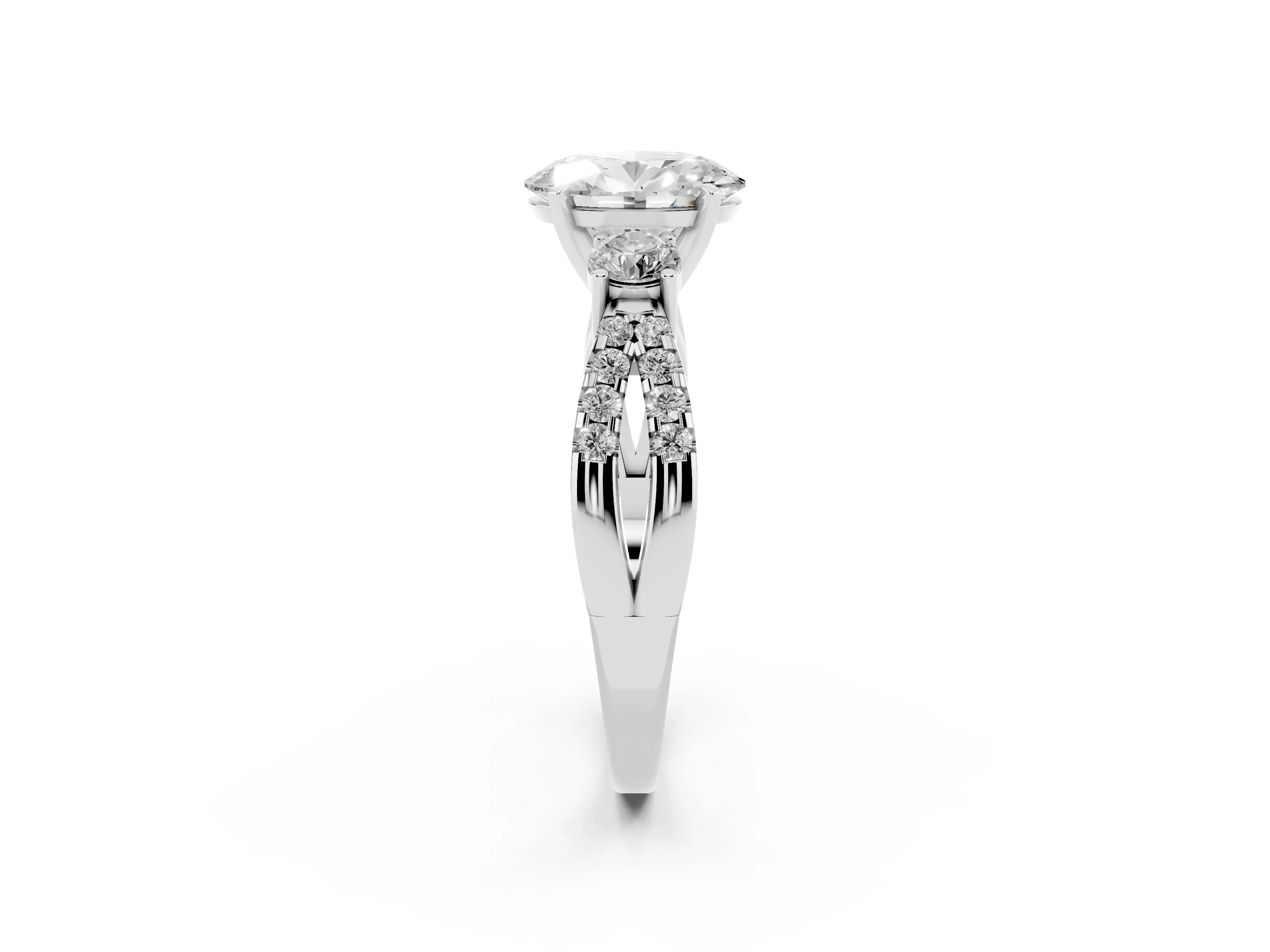 Oval Cut Diamond Three-Stone Ring Set in Platinum with Pavé Split Shank and Prong Setting