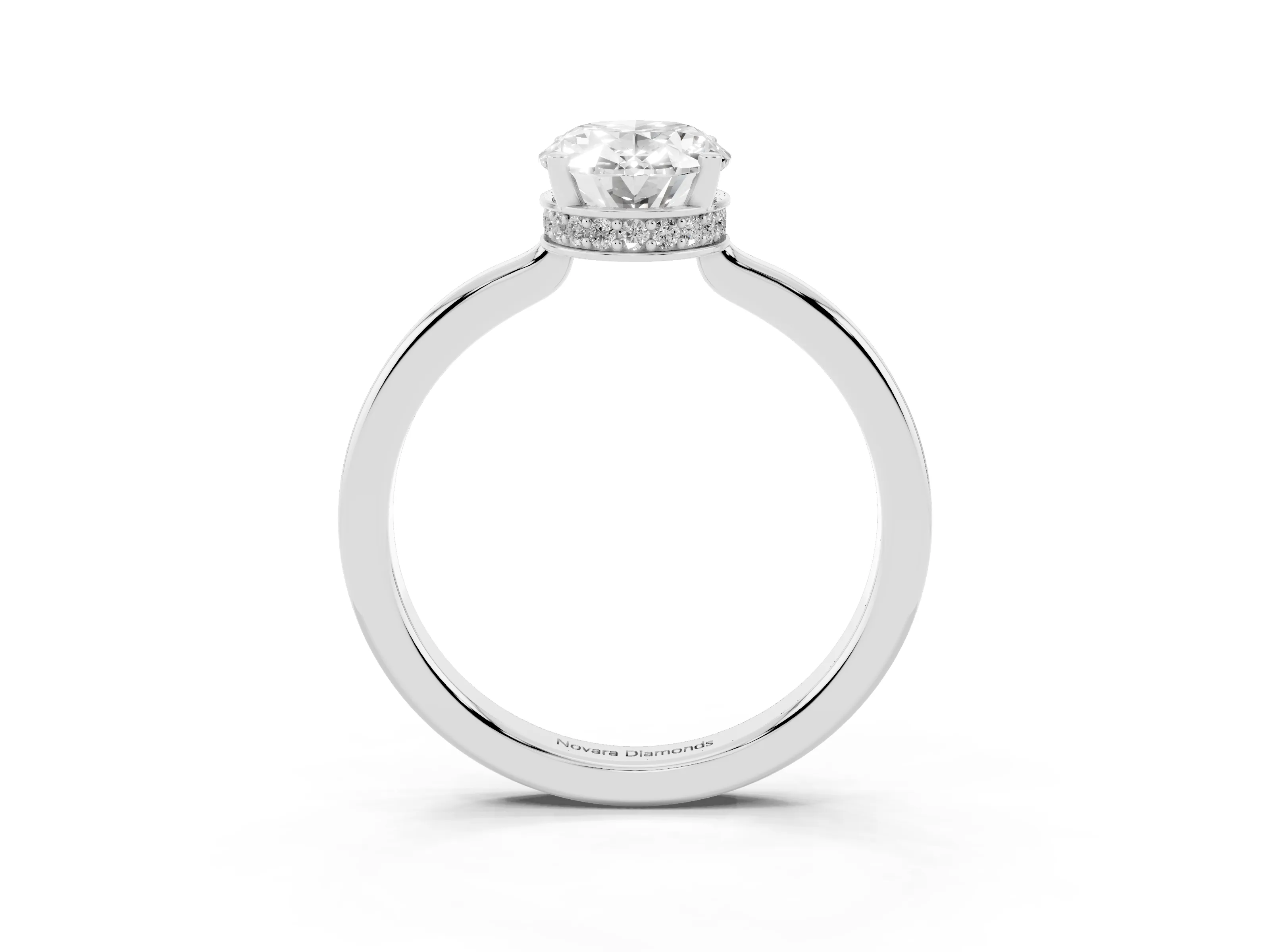 Oval Cut Diamond Solitaire Engagement Ring Set in Silver with Prong Setting on a Plain Band