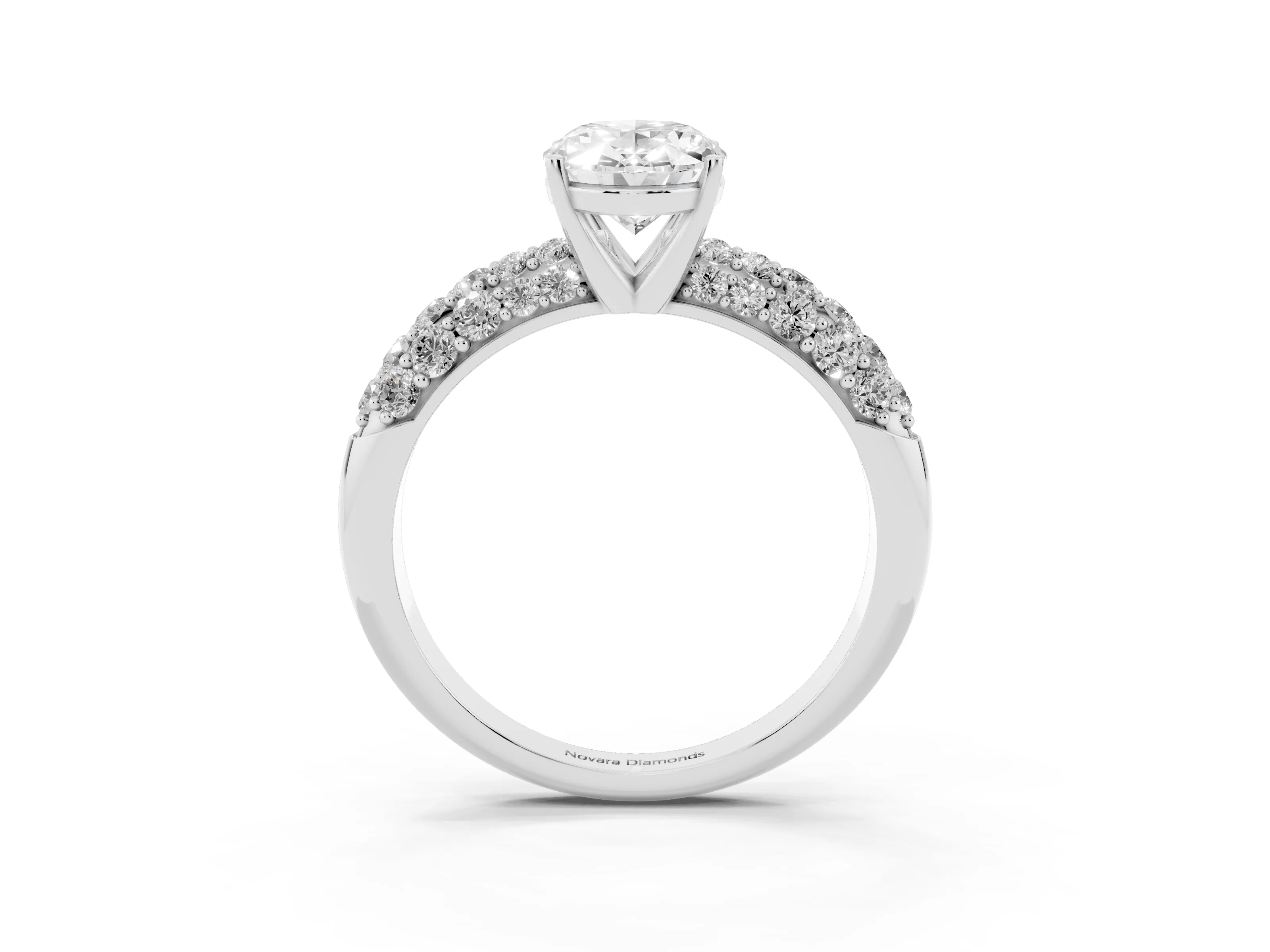 Oval Cut Diamond Pavé Band Solitaire Ring Set in White gold with Close-Set Accent Stones and Prong Setting