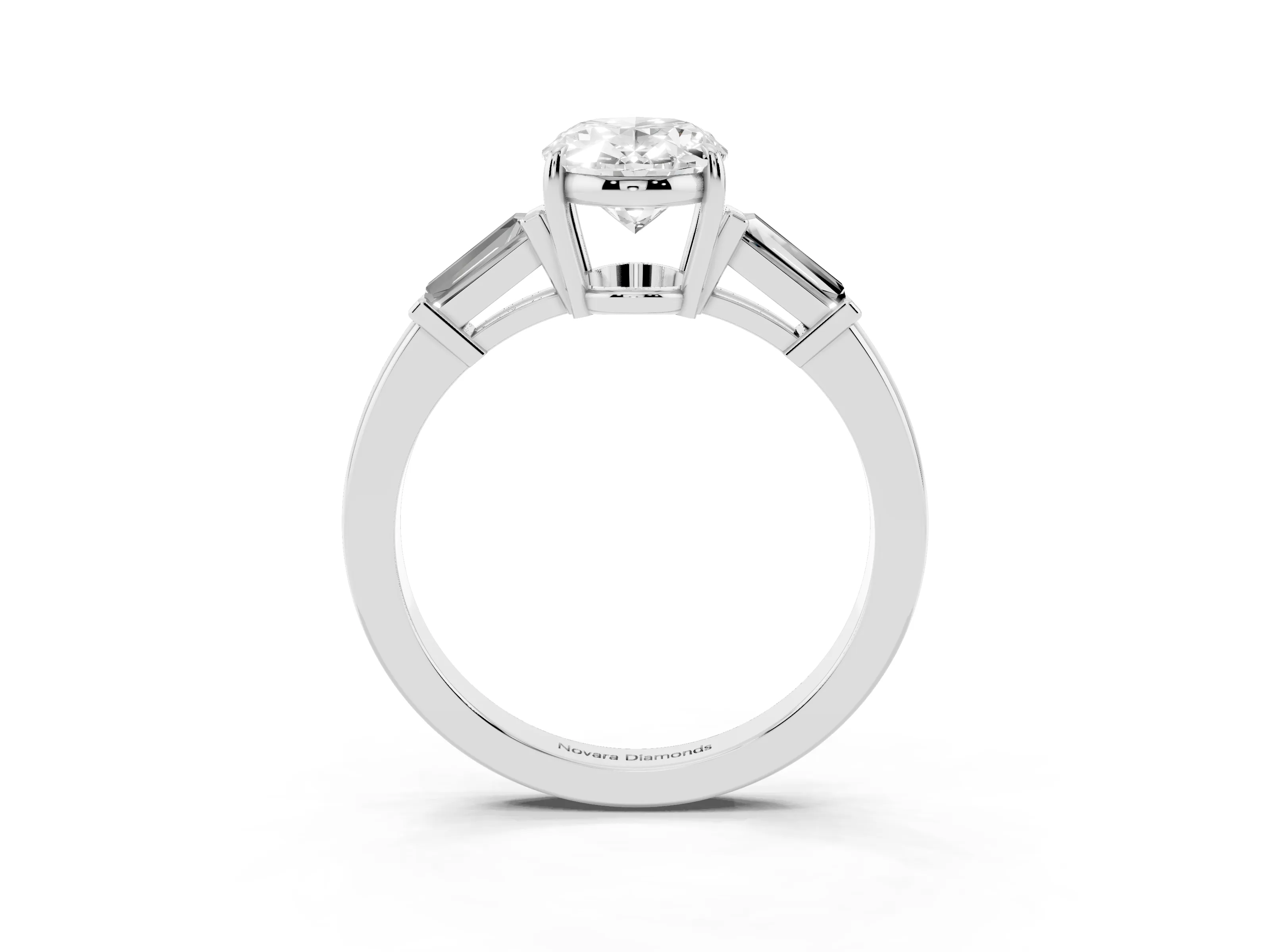 Oval Cut Diamond Three-Stone Ring Set in Platinum with Tapered Baguette Side Stones and Prong Setting