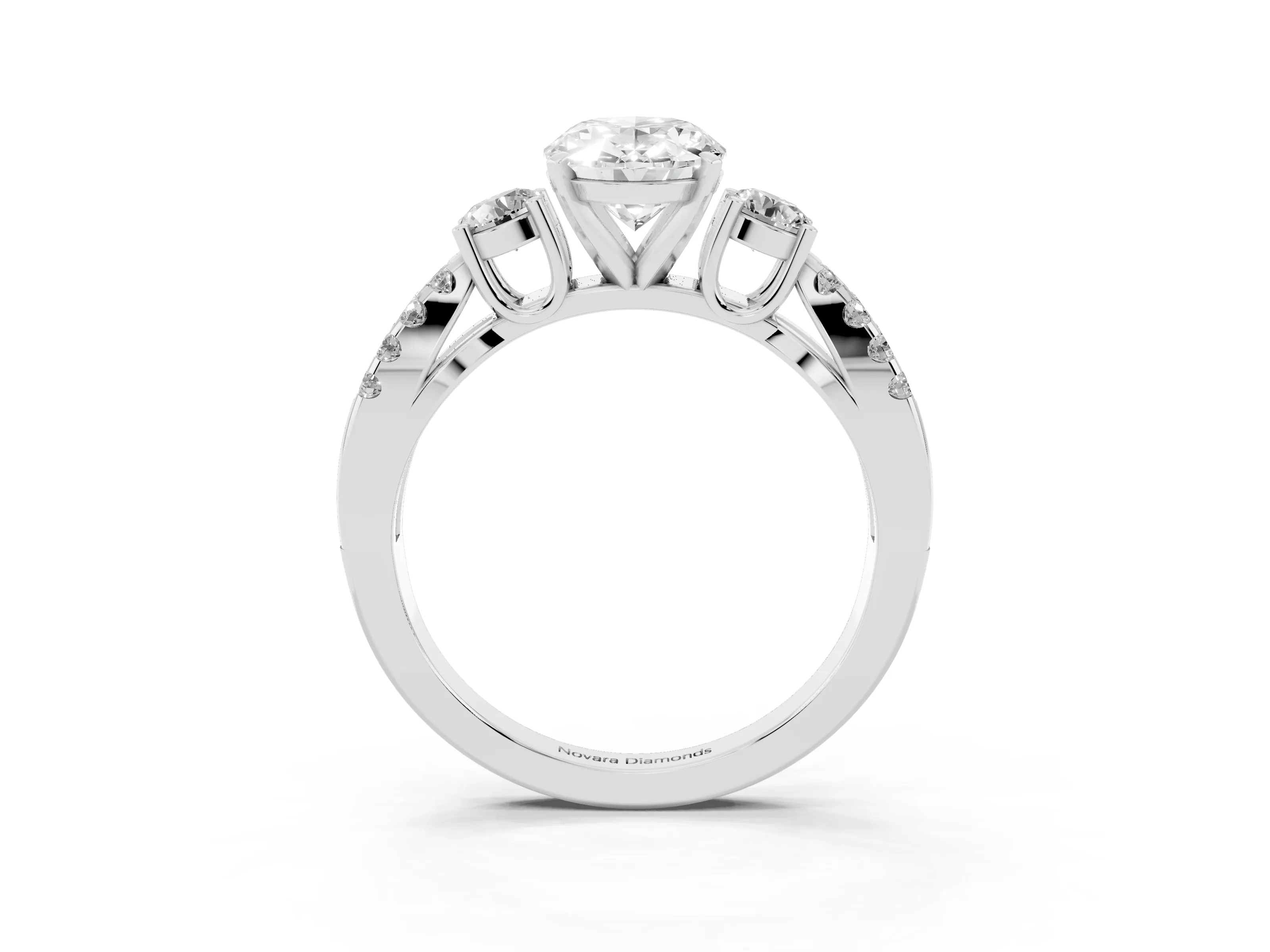 Oval Cut Diamond Three-Stone Ring Set in Platinum with Pavé Split Shank and Prong Setting