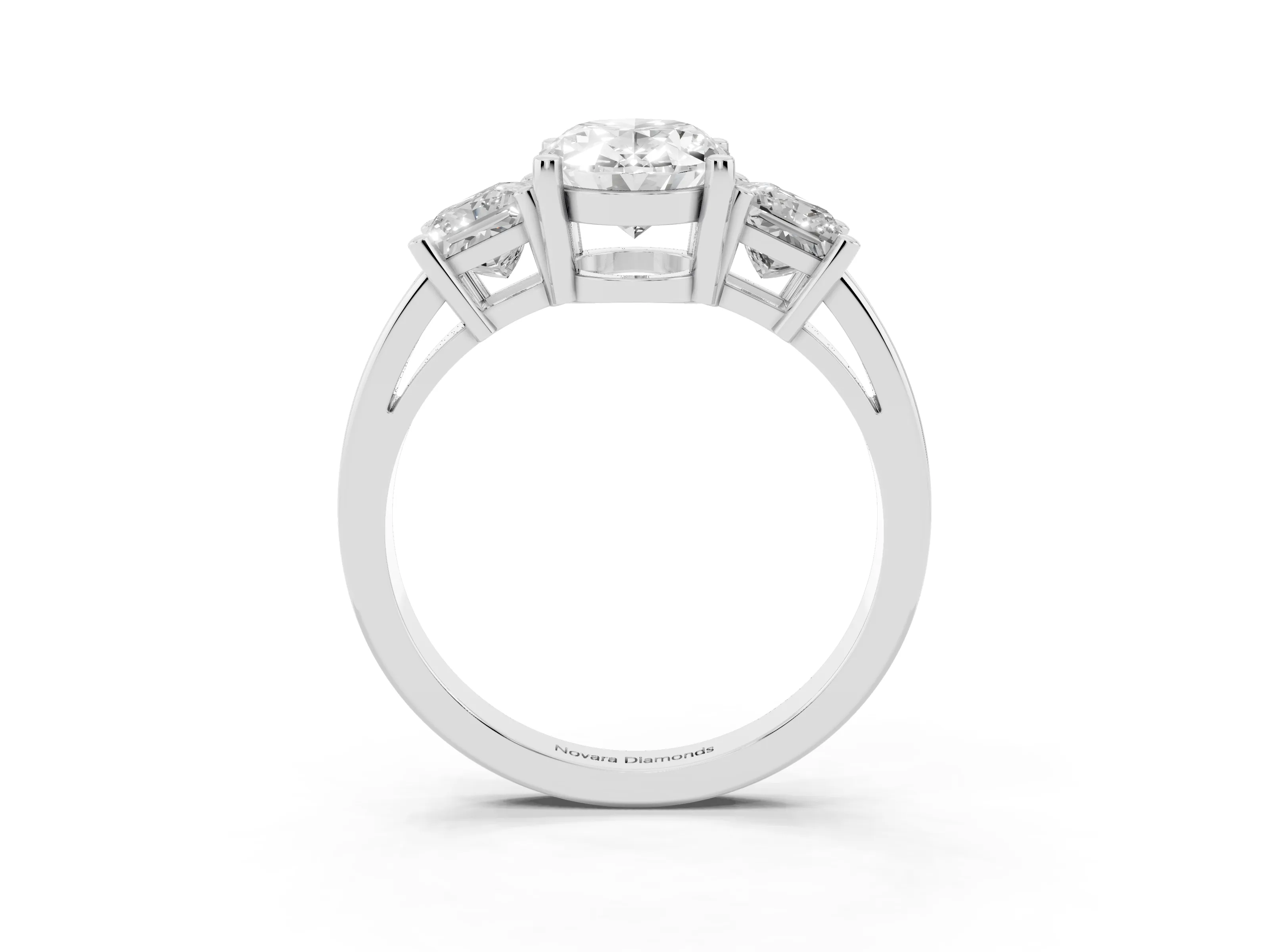 Three-Stone Oval Cut Diamond Solitaire Ring Set in Platinum with Prong Setting