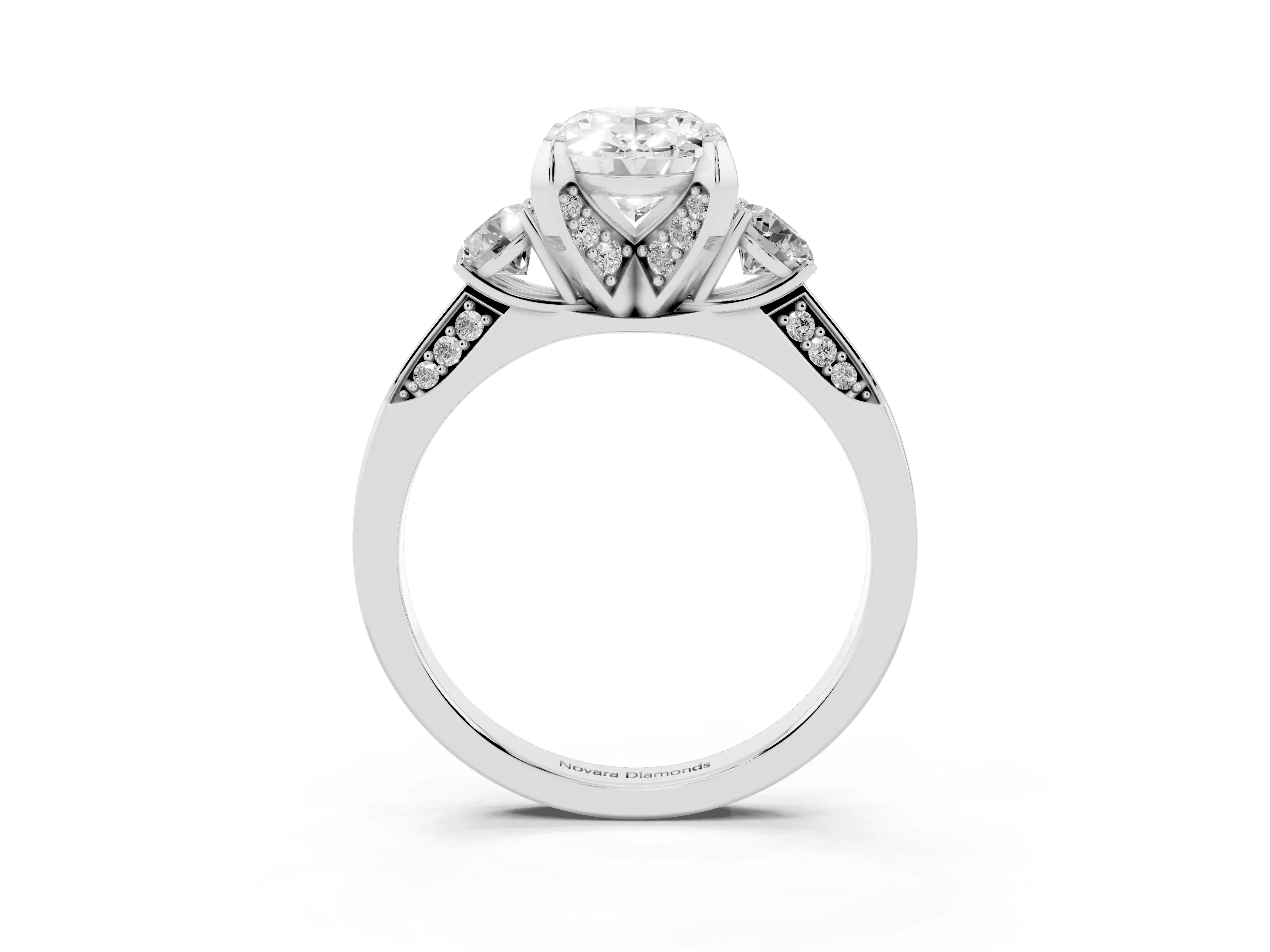 Oval Cut Diamond Three-Stone Ring Set in White gold with Pavé Band and Smaller Side Stones