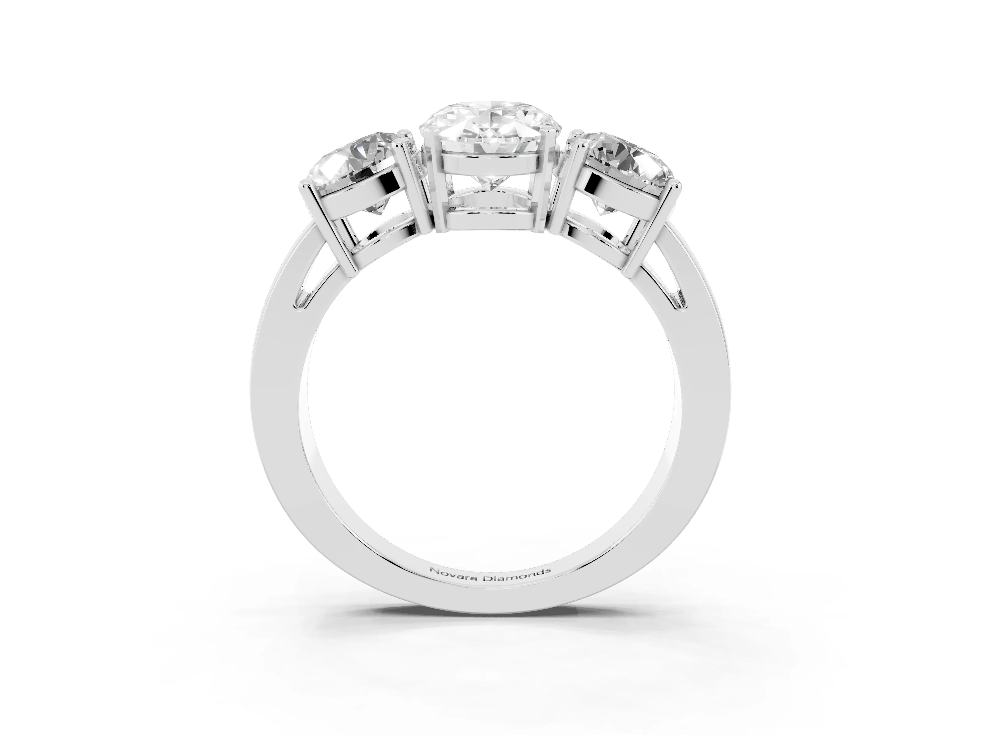Oval Cut Diamond Three-Stone Ring Set in White gold with Round Side Stones and Classic Band