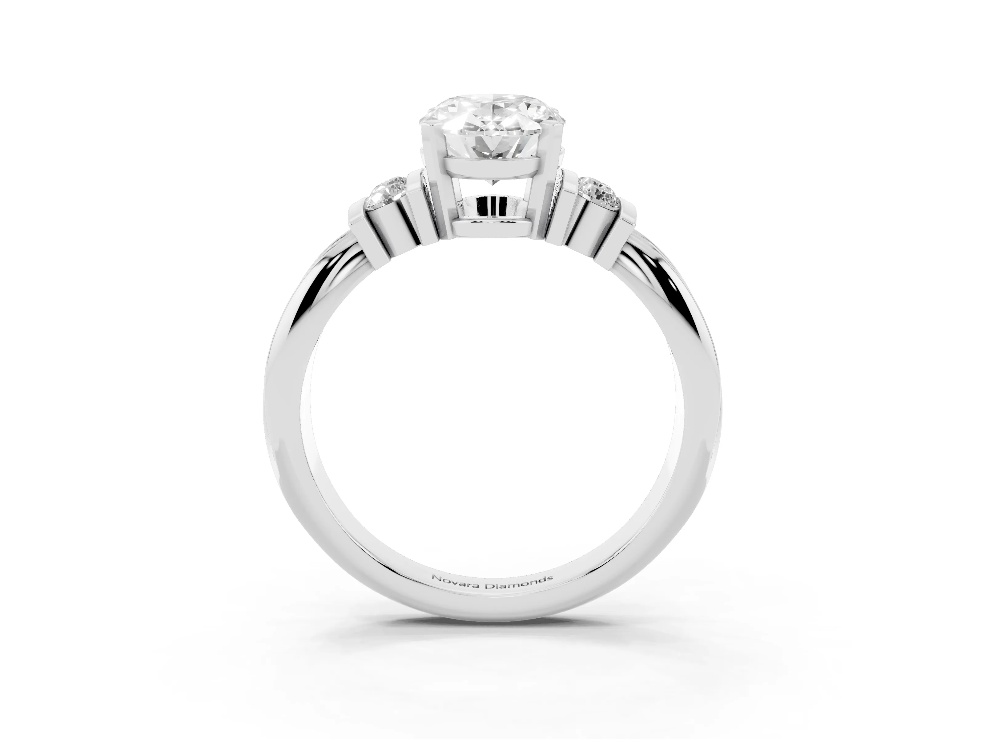 Three-Stone Oval Cut Diamond Channel Set Ring Set in Platinum with Bar Prongs