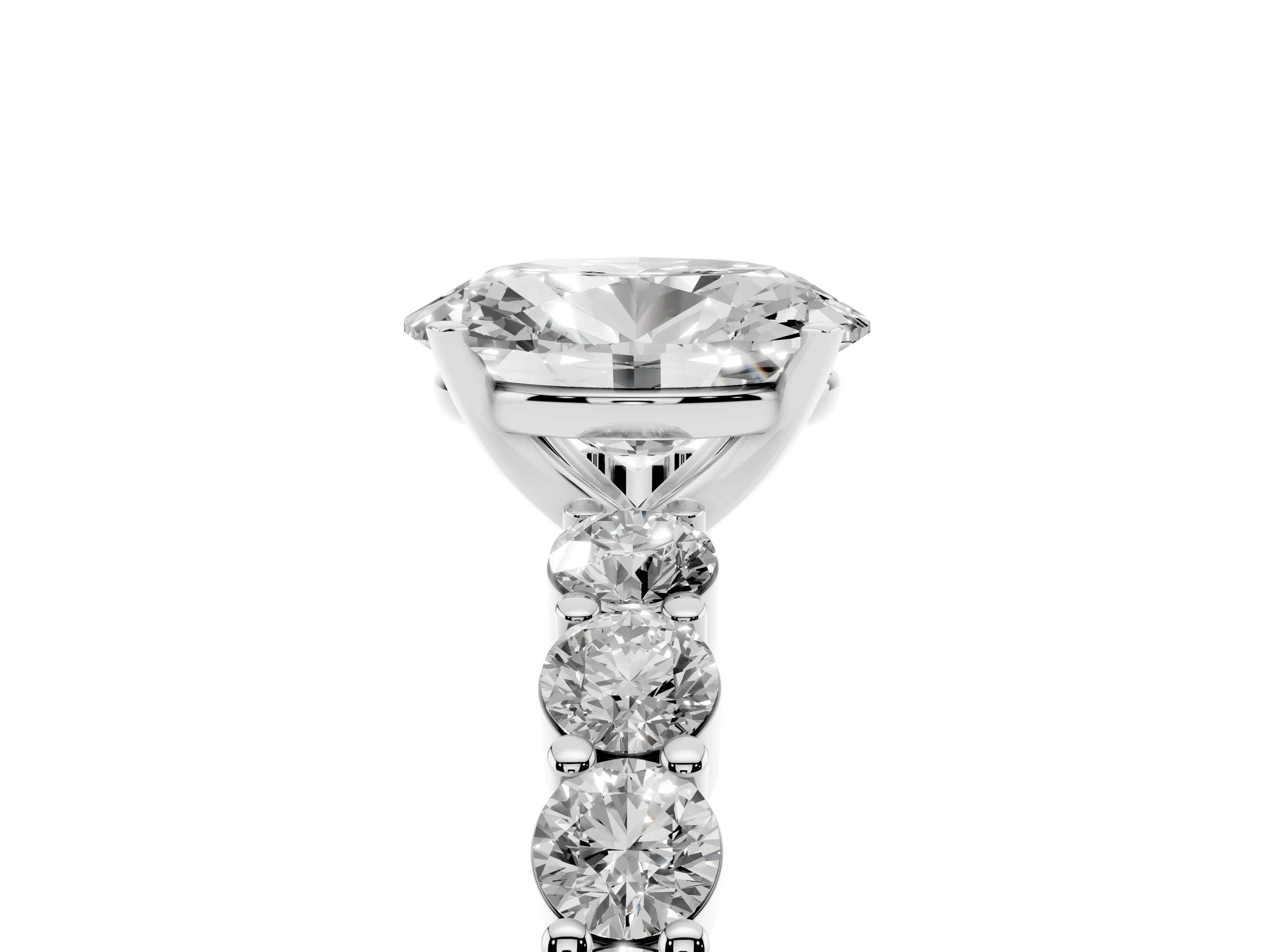 Oval Cut Diamond Solitaire Ring Set in Platinum with Shared Prong Round Side Stones
