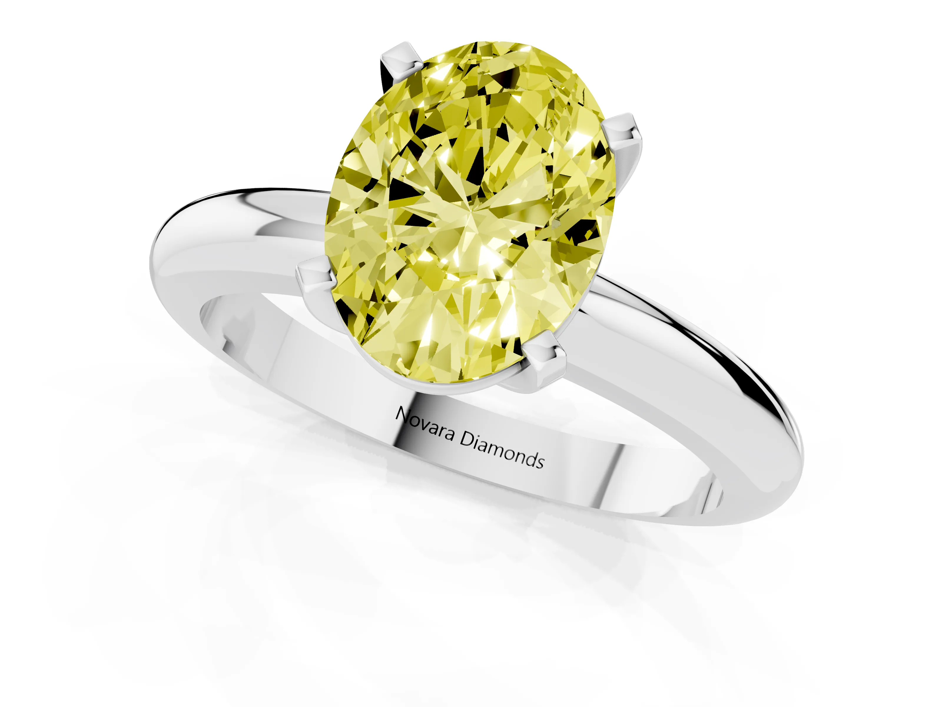 Fancy Yellow Oval Cut Diamond Solitaire Engagement Ring Set in White gold with Round Band and Prong Setting