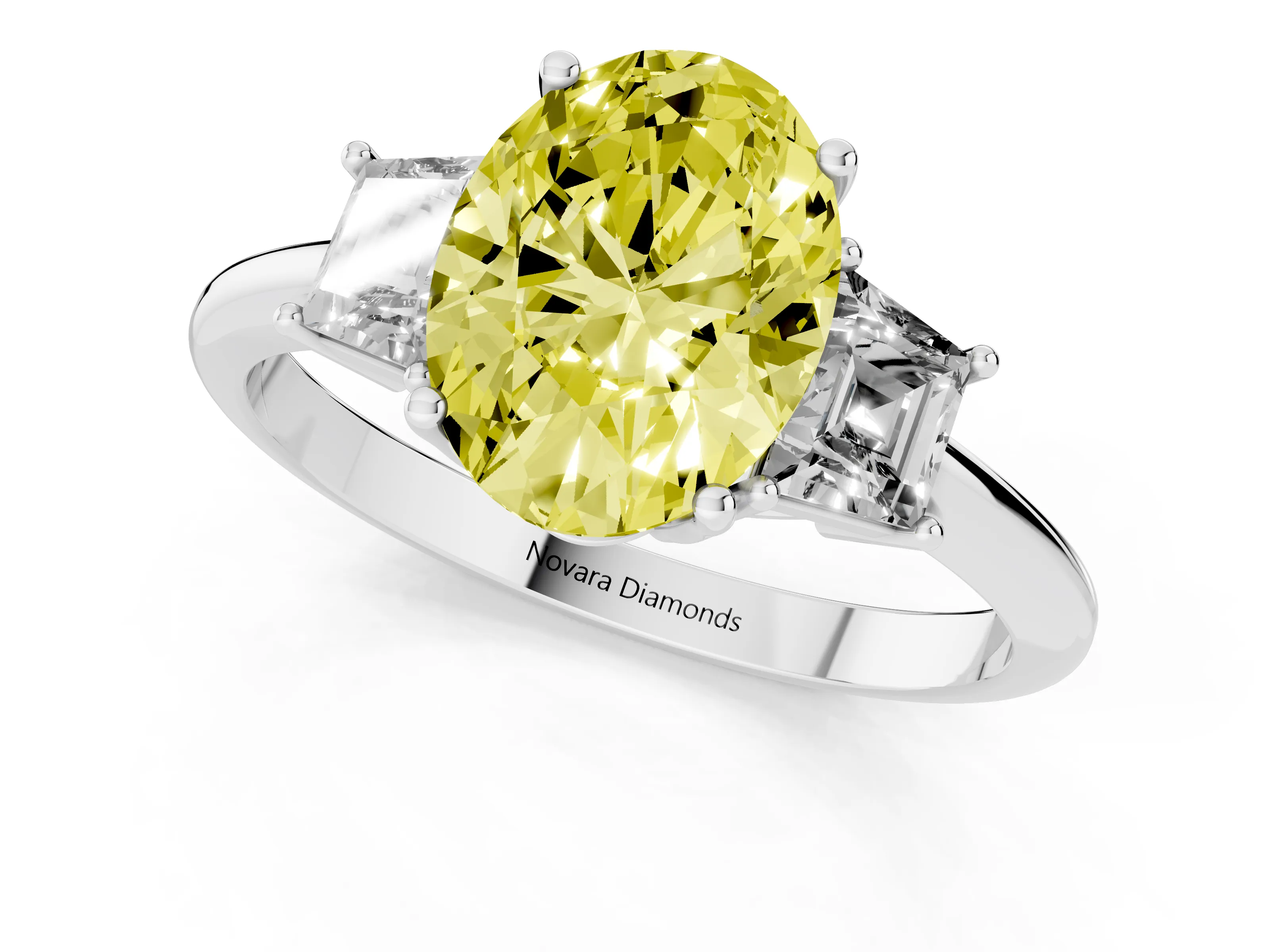 Fancy Yellow Oval Cut Diamond Three-Stone Ring Set in White gold with Trapezoid Side Stones and Prong Setting