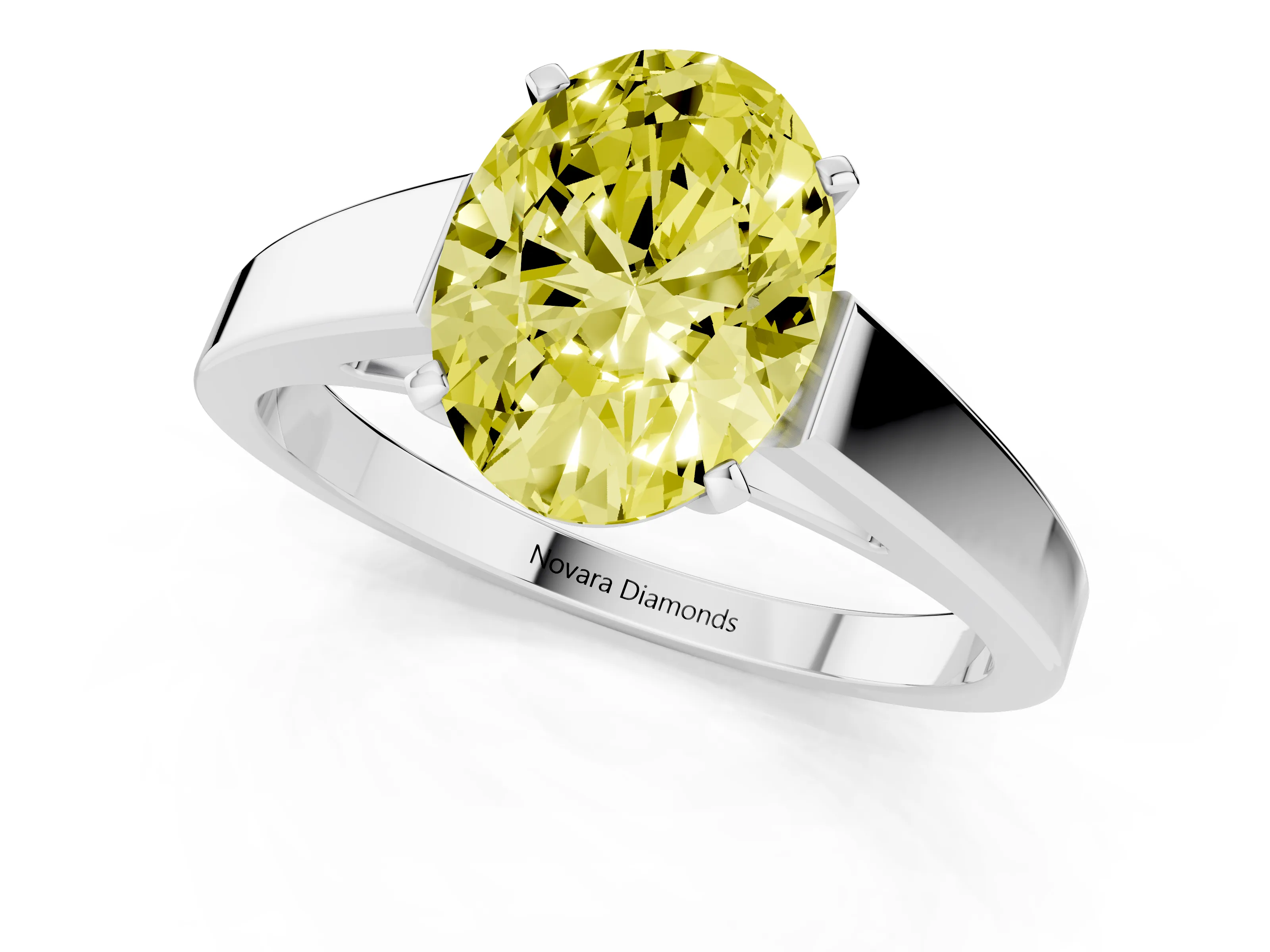 Fancy Yellow Oval Cut Diamond Solitaire Engagement Ring Set in White gold with Prong Setting and Tapered Band