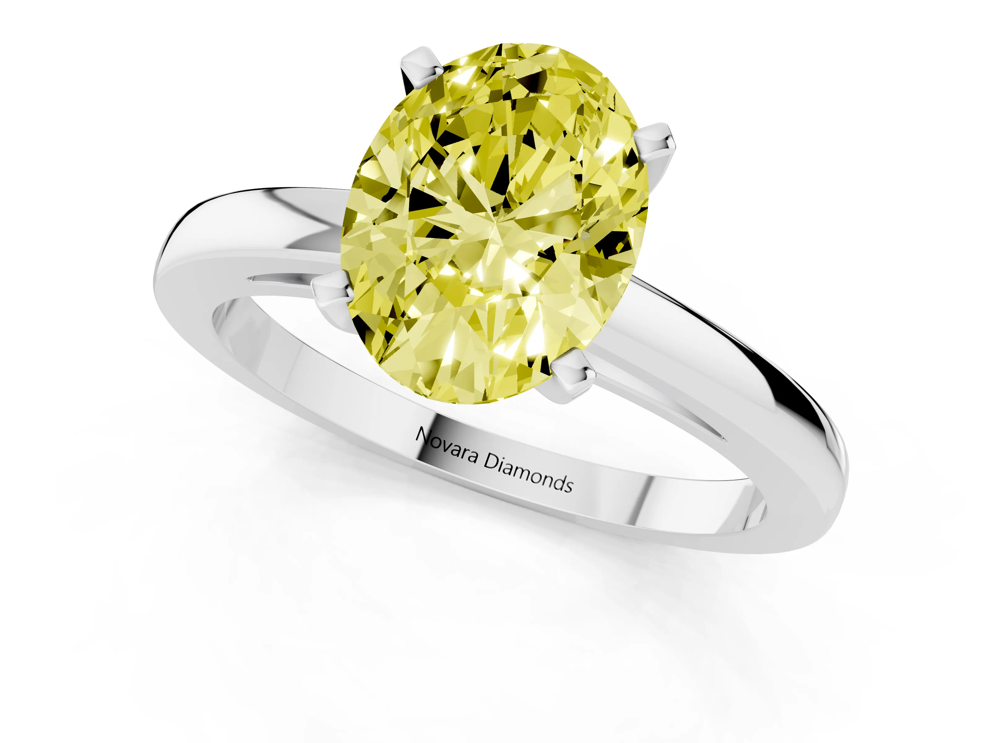 Fancy Yellow Oval Cut Diamond Solitaire Engagement Ring Set in Silver with Prong Setting on a Classic Band