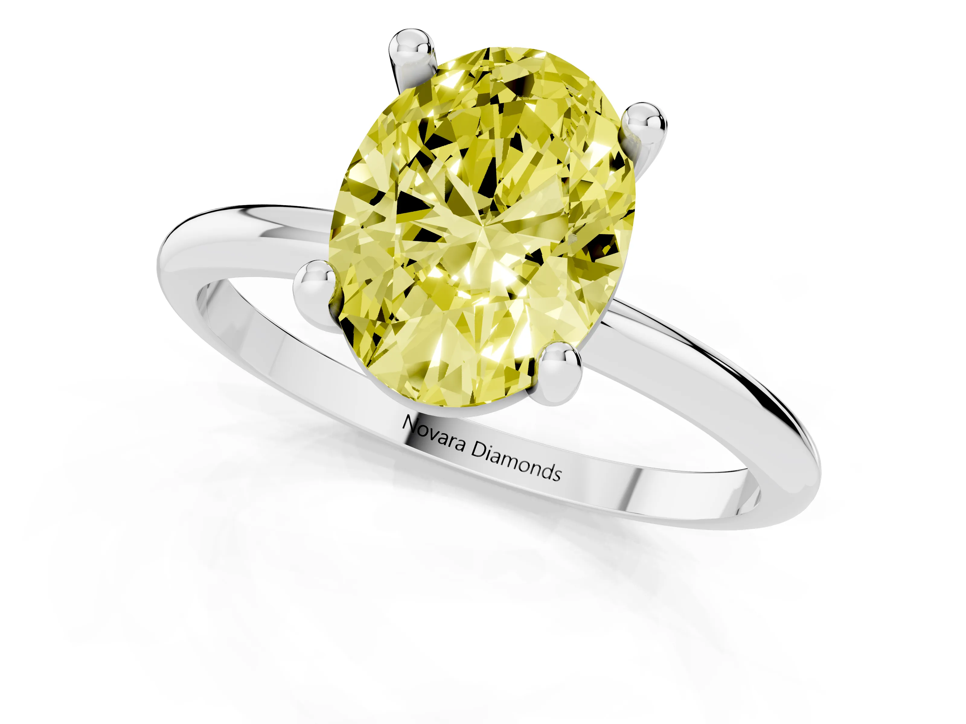 Fancy Yellow Oval Cut Diamond Solitaire Ring Set in Silver with Secure Prong Setting on a Classic Band