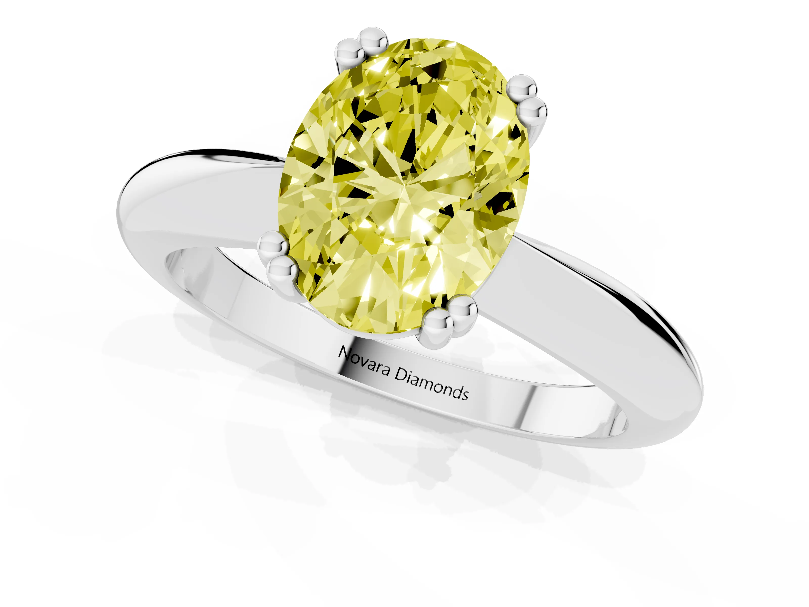 Fancy Yellow Oval Cut Diamond Solitaire Engagement Ring Set in White gold with Tapered Band and Prong Setting