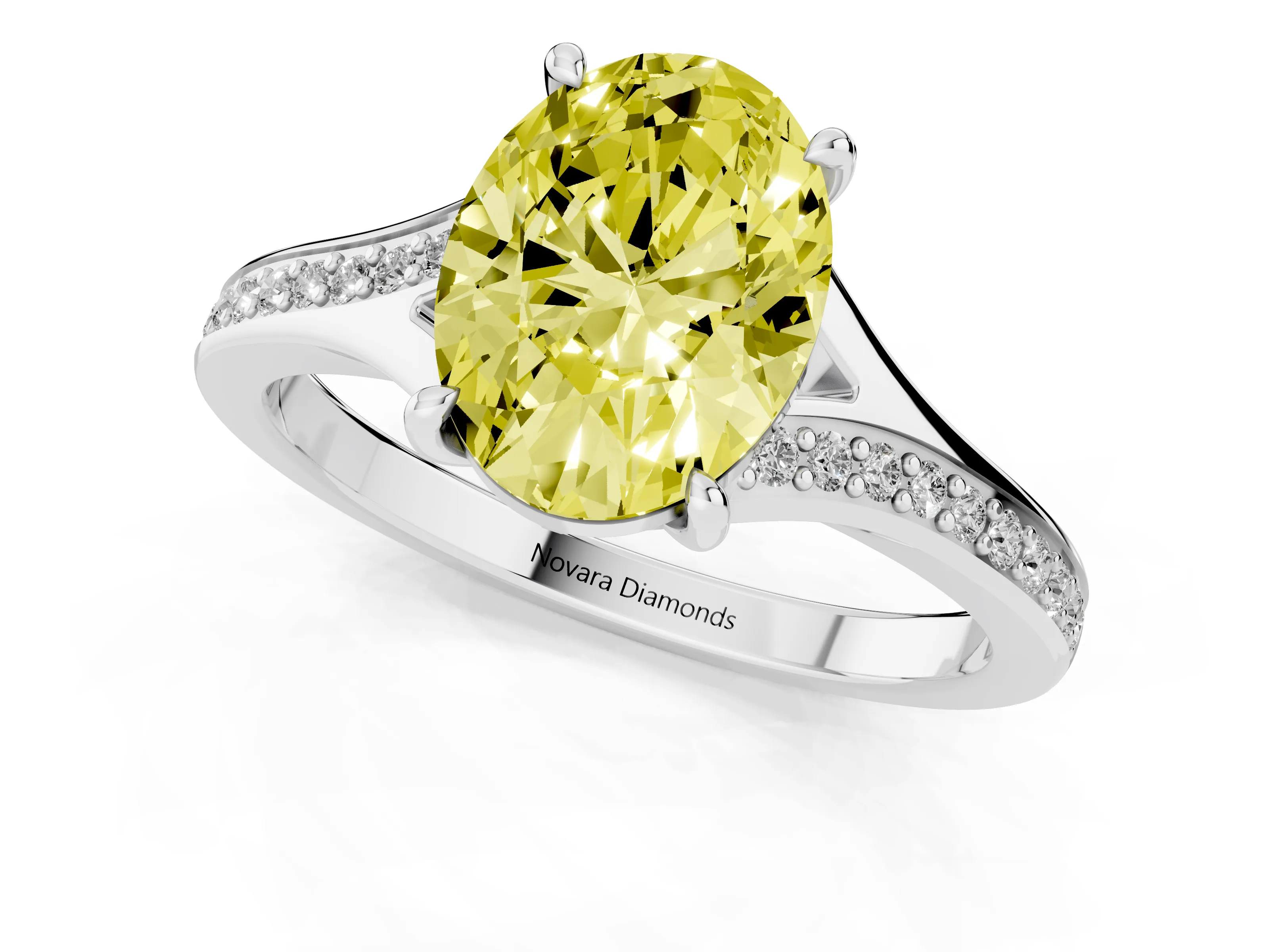 Fancy Yellow Oval Cut Diamond Solitaire Ring Set in White gold with Pavé Accent Band and Classic Prong Setting