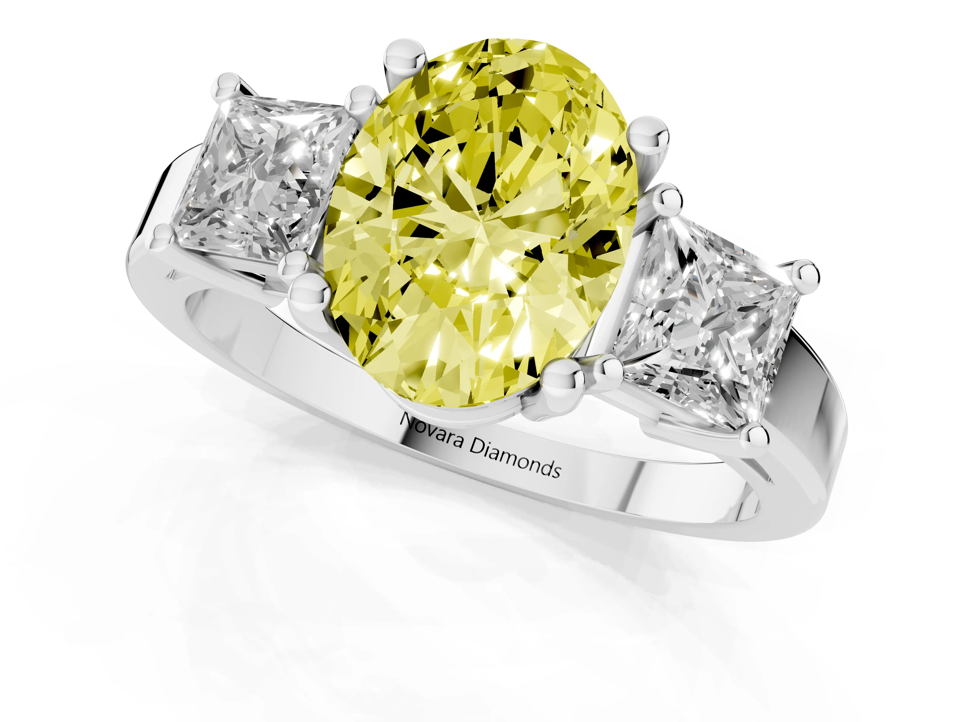 Fancy Yellow Three-Stone Oval Cut Diamond Solitaire Ring Set in Platinum with Prong Setting