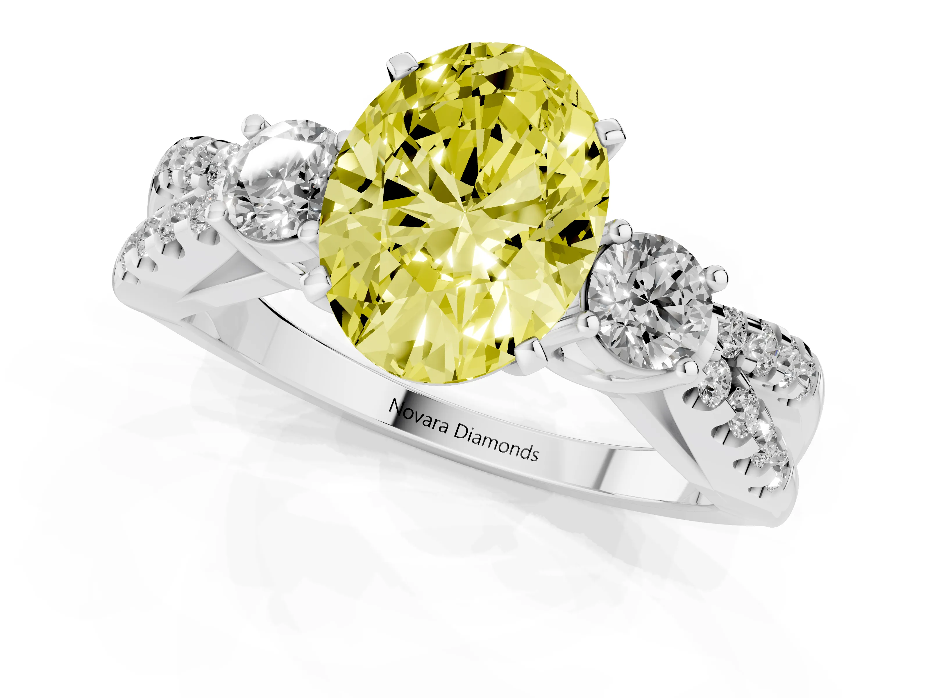 Fancy Yellow Oval Cut Diamond Three-Stone Ring Set in White gold with Pavé Split Shank and Prong Setting