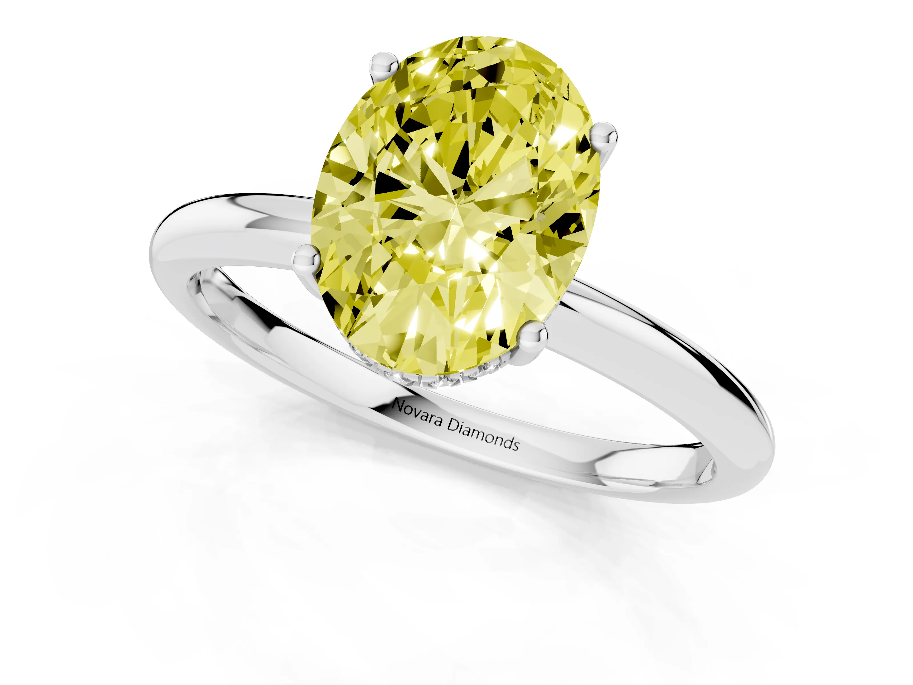 Fancy Yellow Oval Cut Diamond Solitaire Engagement Ring Set in White gold with Prong Setting and Polished Band