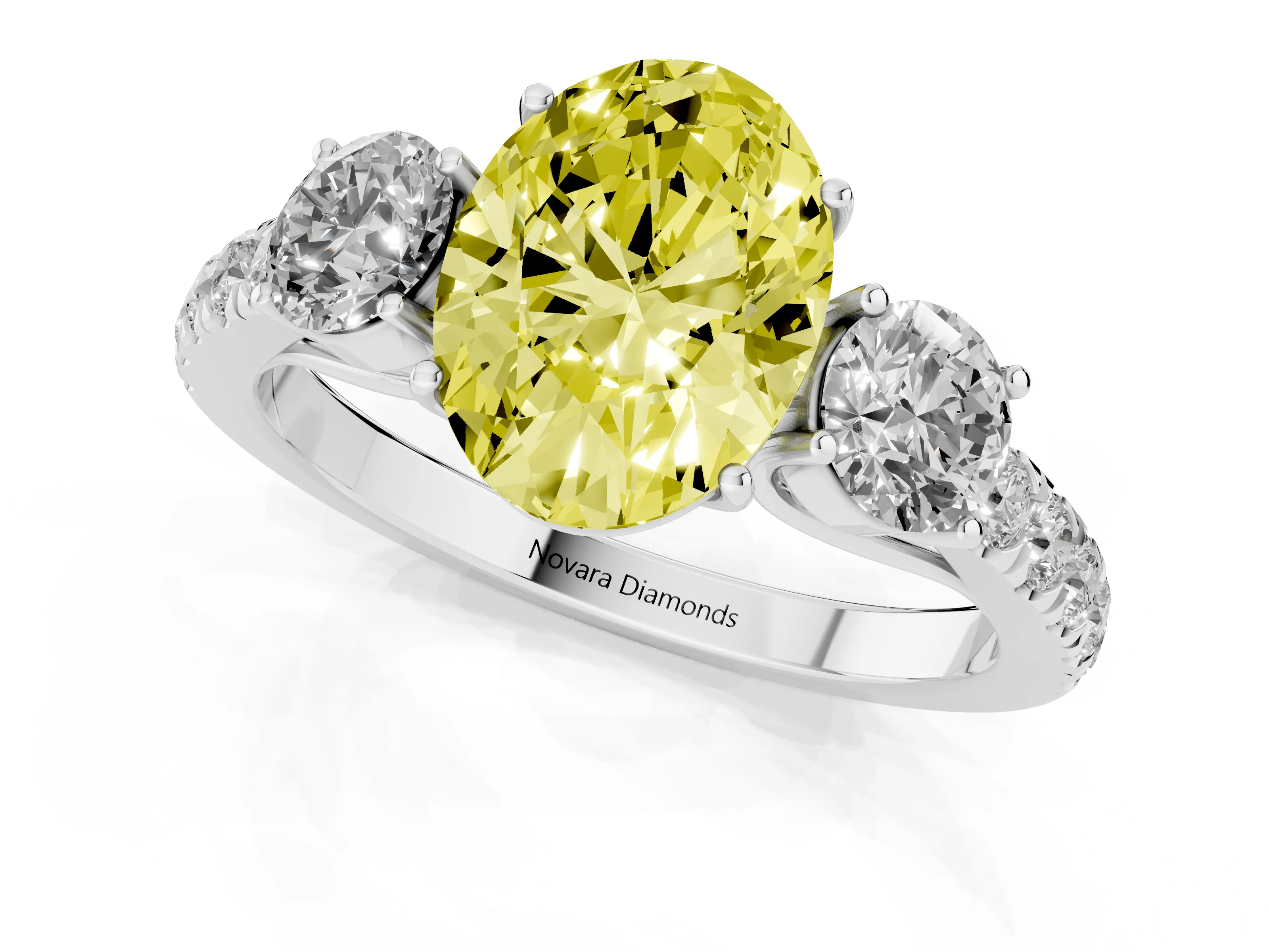 Fancy Yellow Oval Cut Diamond Three-Stone Ring Set in Silver with Round Side Stones and Delicate Pavé Band