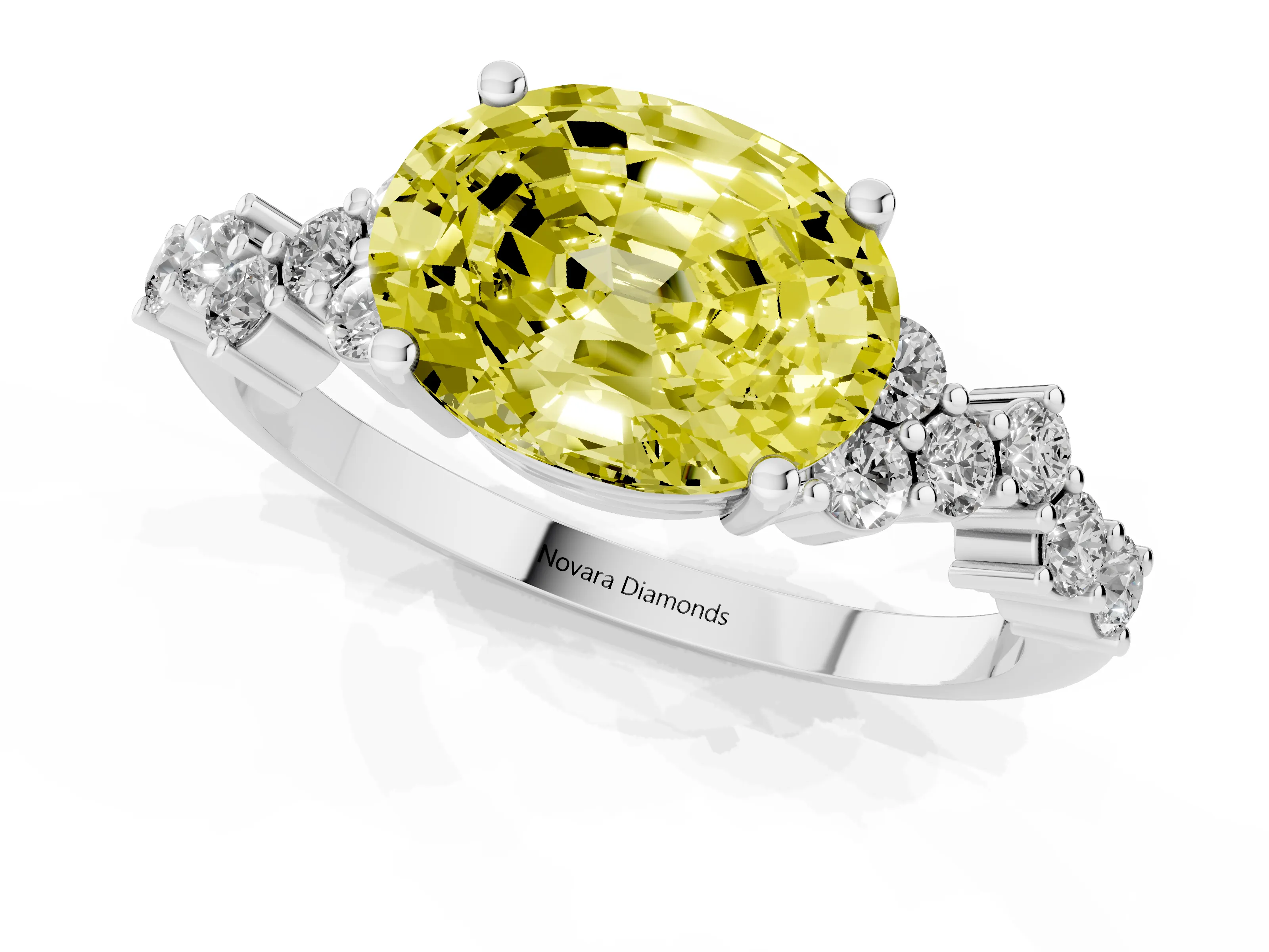 Fancy Yellow Oval Cut Diamond Ring Set in White gold with Scattered Round Accents