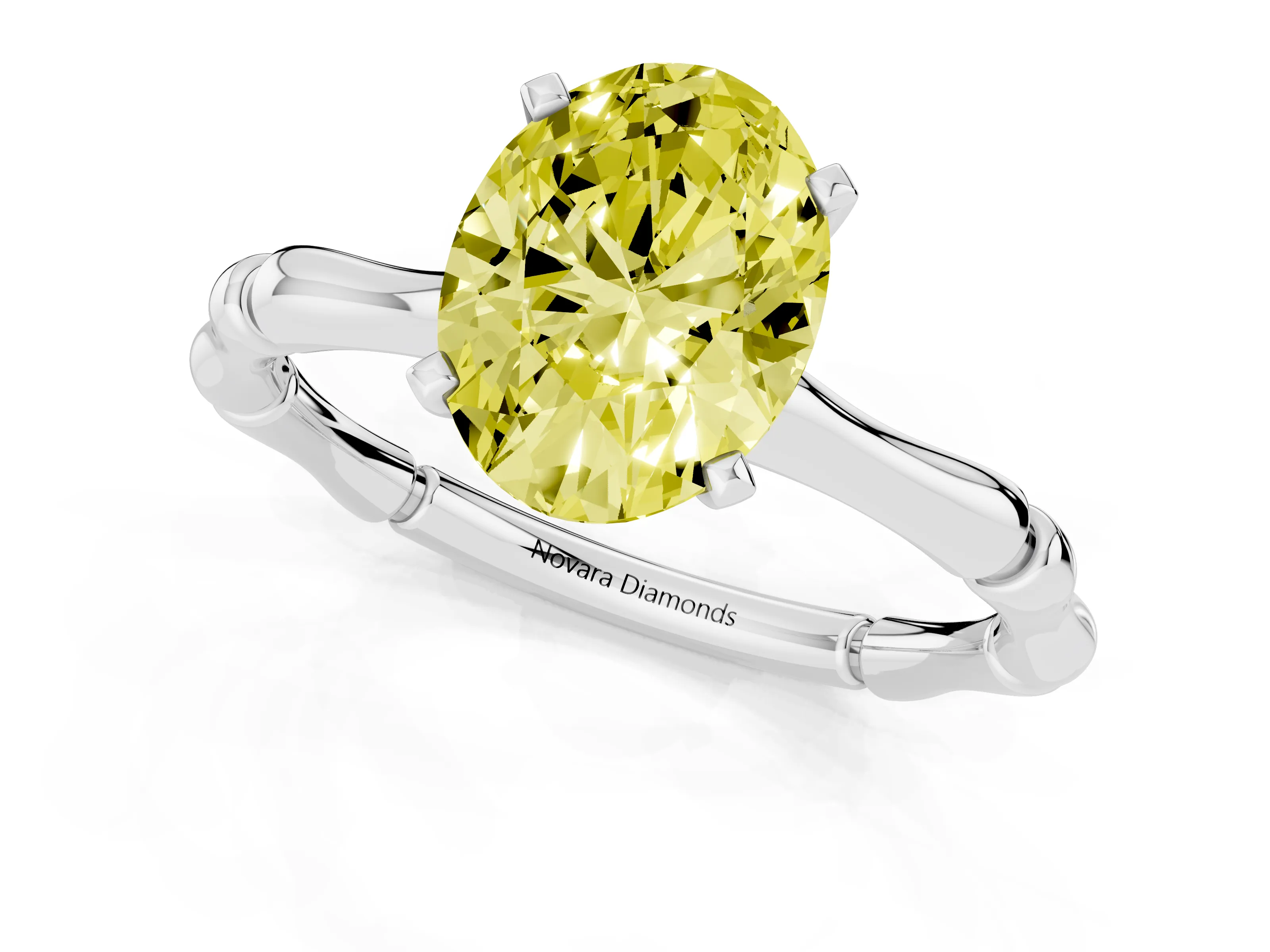 Fancy Yellow Oval Cut Diamond Solitaire Ring Set in Platinum with Bamboo Band and Prong Setting
