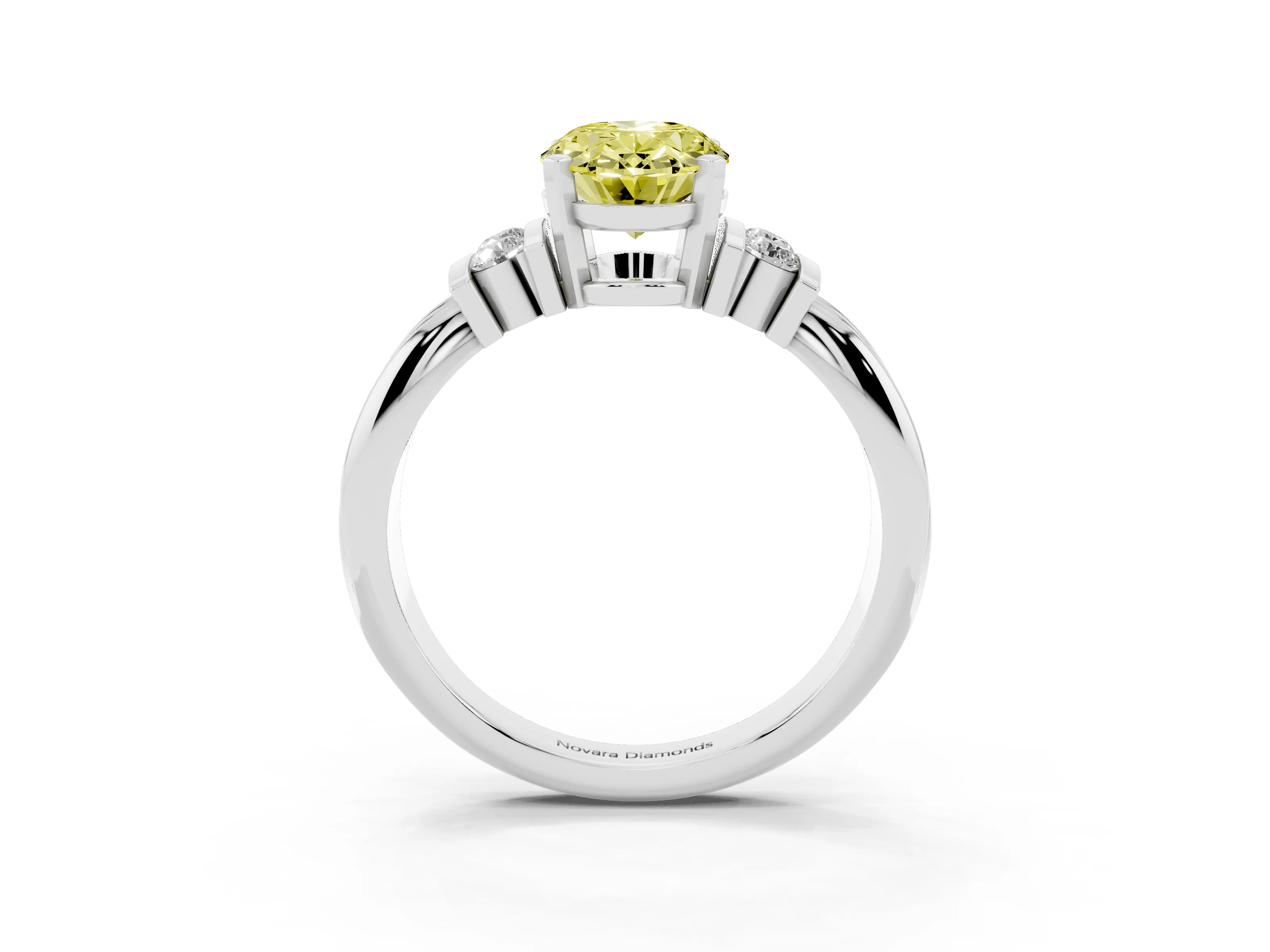 Fancy Yellow Three-Stone Oval Cut Diamond Channel Set Ring Set in White gold with Bar Prongs